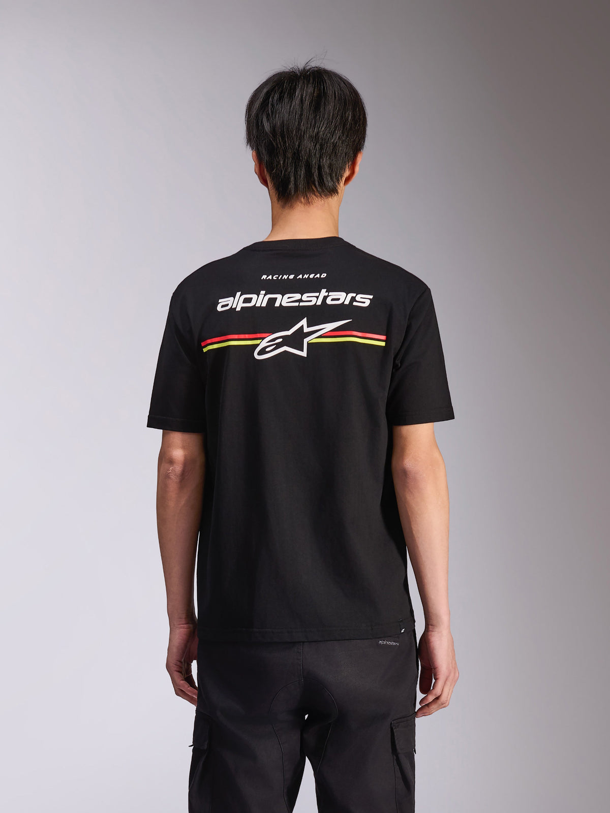 Alpinestars Lanes CSF Tee, Short Sleeve T-Shirt, Black, back view featuring white Alpinestars logo and Astars star with red and yellow stripes, Casual Motorsport Streetwear