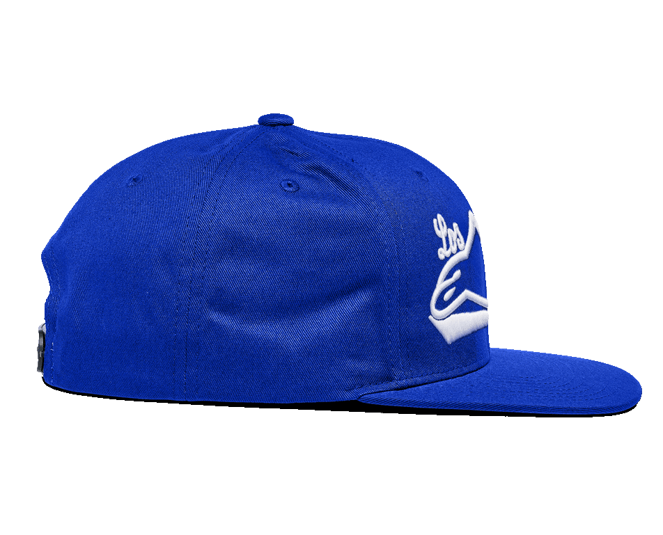 Alpinestars Los Angeles Hat, boné snapback azul, vista lateral, com aba reta e coroa estruturada, sarja de algodão azul vivo com bordado 3D branco, vestuário desportivo casual