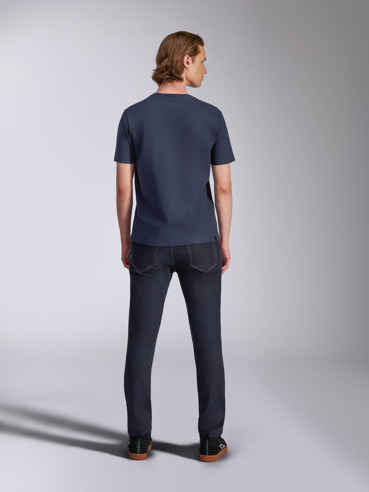 Alpinestars Fasting CSF Tee, Short Sleeve T-Shirt, Navy Blue, back view, worn with dark denim jeans, casual motorsport streetwear