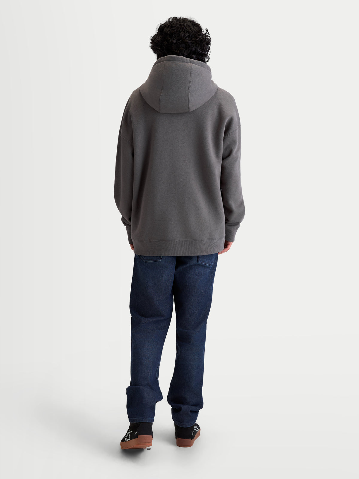 Alpinestars Entity Oversized Hoodie, Sportswear Zip-Up Fleece, Unisex, Charcoal Gray, Back View on Model showing Relaxed Fit, Self-Lined Hood, and Ribbed Cuffs, Cotton and Recycled Polyester Blend
