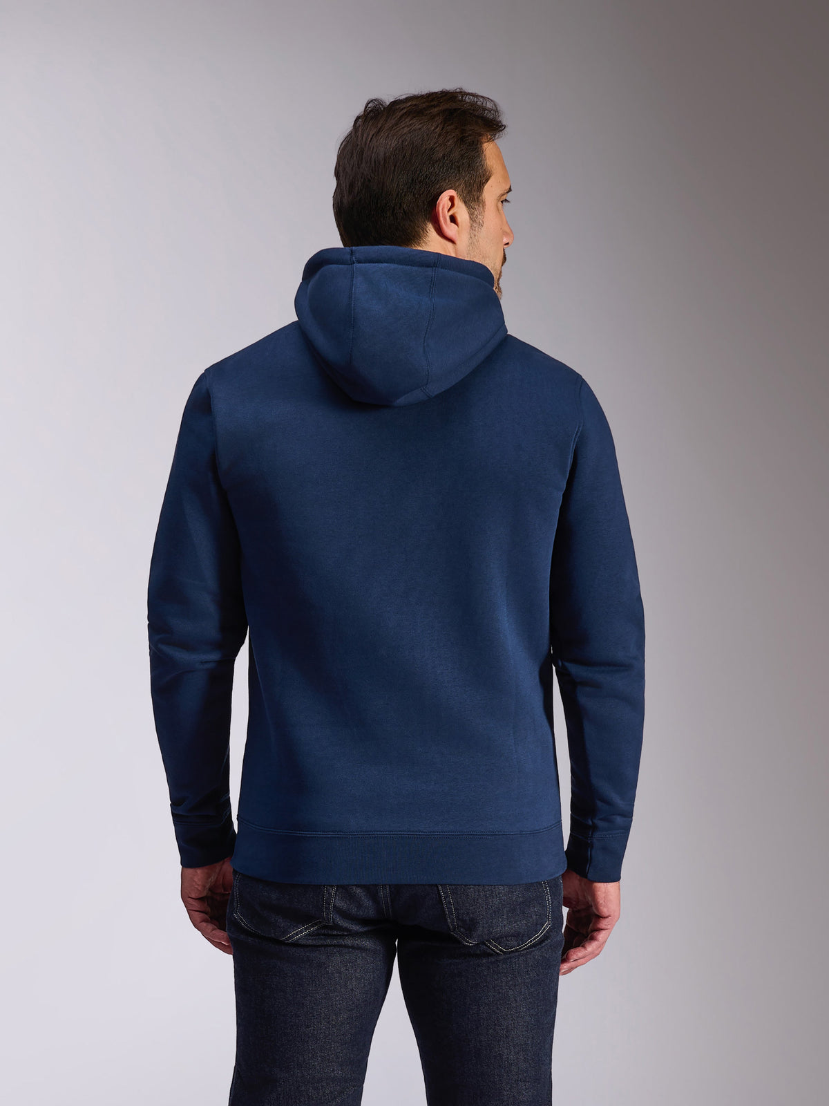Alpinestars Ride V3 Hoodie, camisola com capuz em malha polar azul marinho, vista traseira mostrando design azul liso com capuz forrado a jersey, punhos e bainha canelados, streetwear casual de desporto motorizado