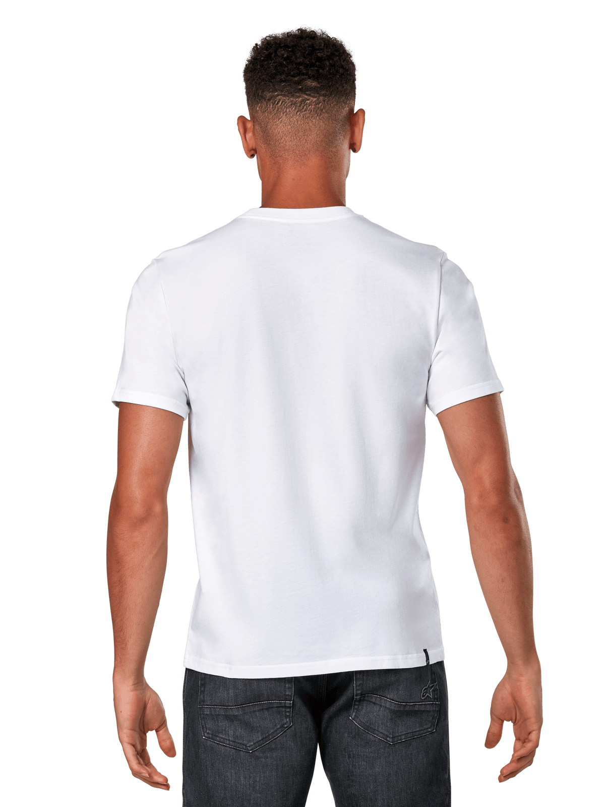 T-shirt Alpinestars Glyfs CSF, T-shirt de manga curta, branca, vista traseira de modelo masculino a usar t-shirt branca lisa e calças de ganga escuras, streetwear casual de desporto motorizado