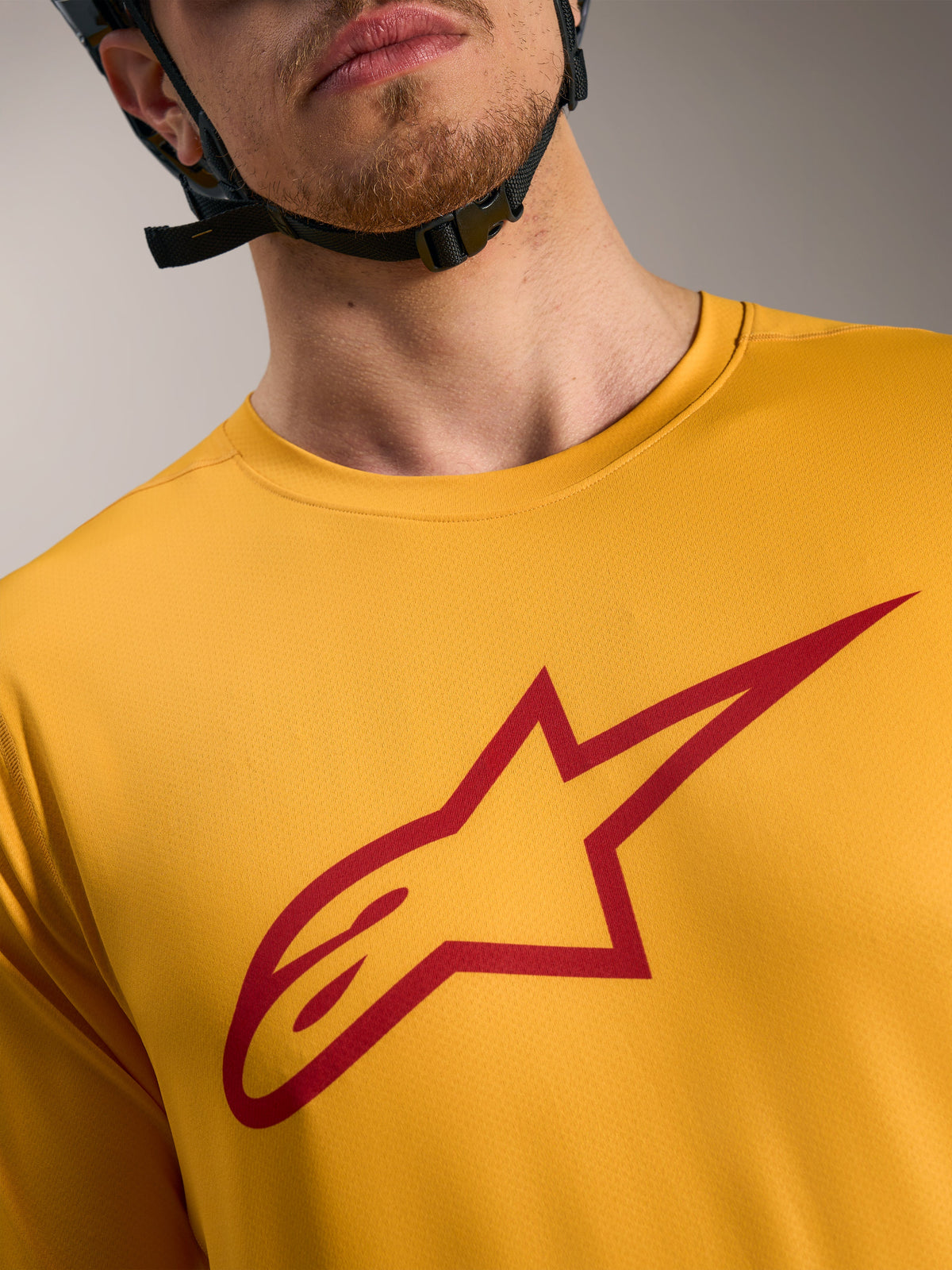 Camisola A-Dura Ride laranja com logótipo Astars vermelho no peito, vestuário de mangas curtas leve para MTB.