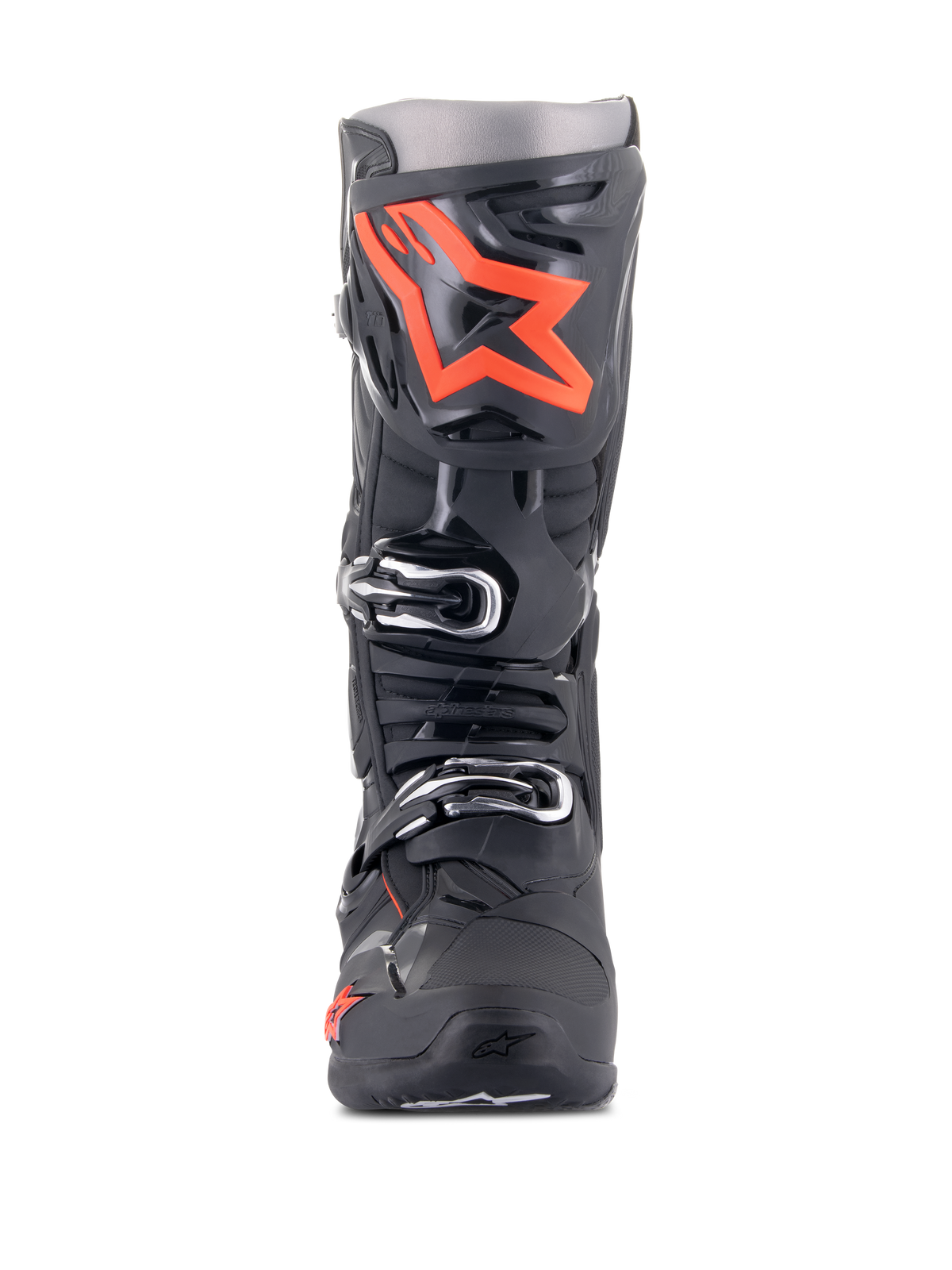 Botas Alpinestars Tech 10, botas de motocross, preto e vermelho fluo, vista frontal, com um logótipo de estrela grande em vermelho fluorescente na caneleira, fivelas prateadas e chassis durável em TPU preto