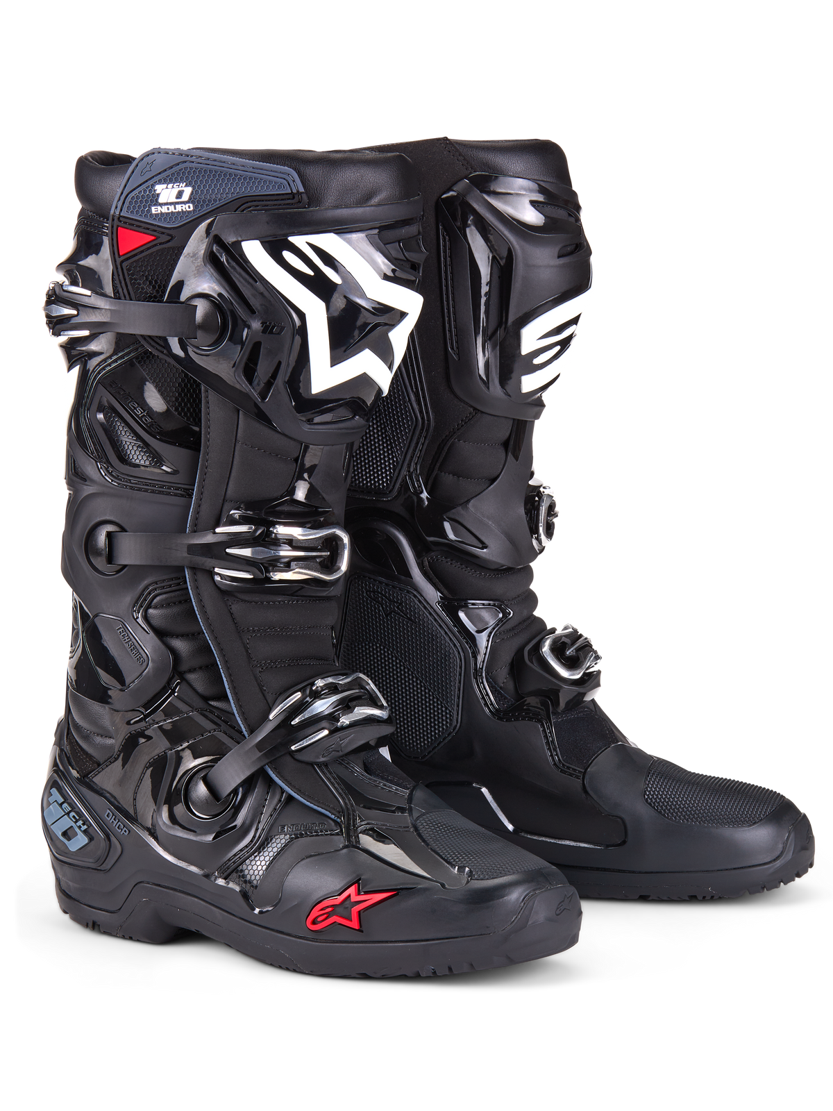 Botas Alpinestars Tech 10 Enduro, botas de motocross, pretas com logótipo branco na canela e pequeno detalhe de estrela vermelha, sistema de fecho triplo de fivelas, proteção em TPU durável e sola de enduro especializada para corridas todo-o-terreno