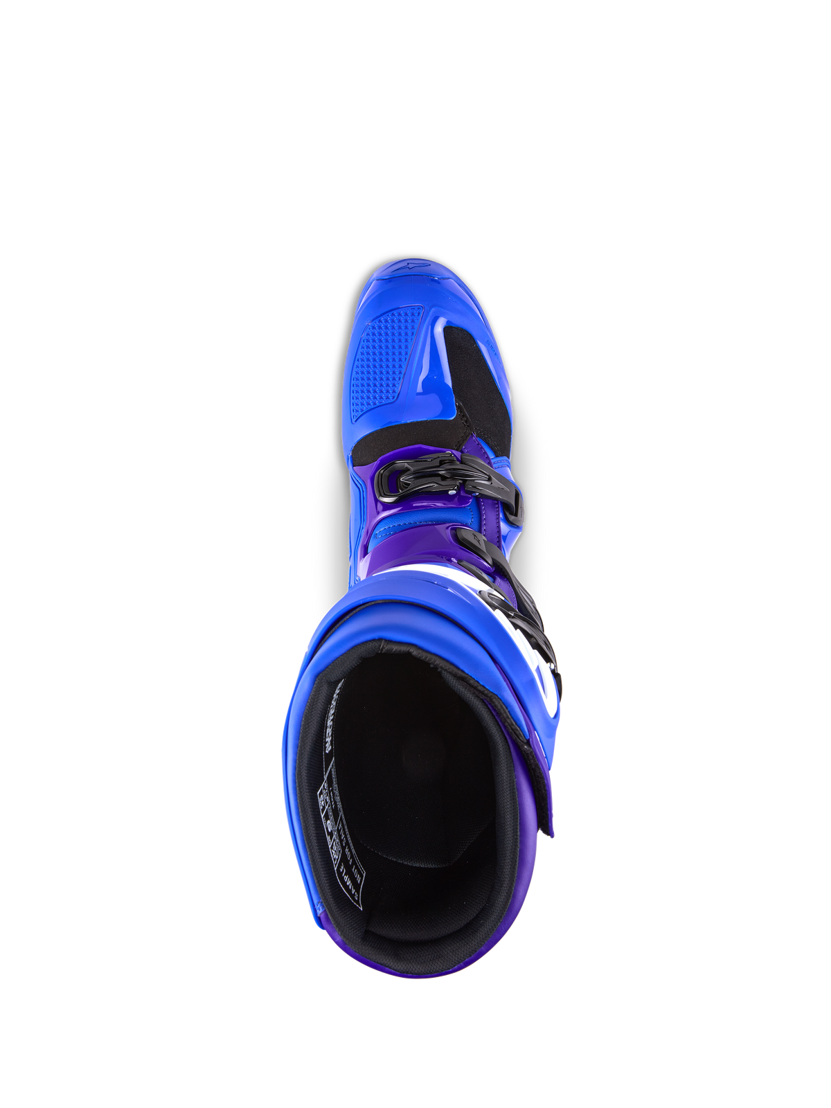 Botas Alpinestars Tech 7, botas de motocross, azuis com detalhes em roxo e preto, vista superior mostrando o forro interior e o sistema de fivelas, construção durável em TPU e microfibra para desempenho todo-o-terreno