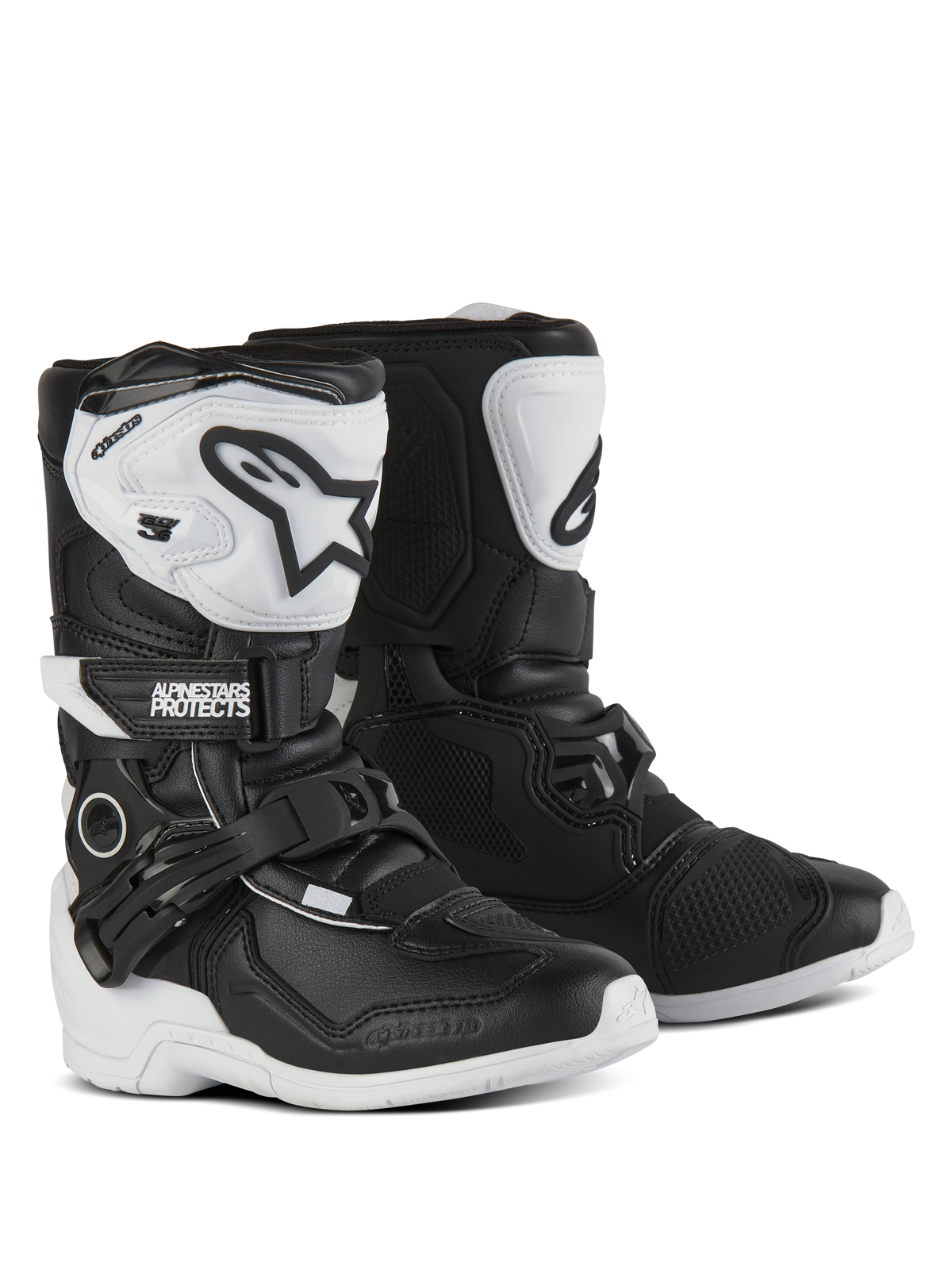 Botas Alpinestars Kids Tech 3S, botas de motocross, pretas e brancas, com placas de tíbia em TPU brancas e logótipos Alpinestars pretos, fechos de fivela ajustável e de gancho e laço, solas de borracha duráveis para proteção infantil em todo-o-terreno