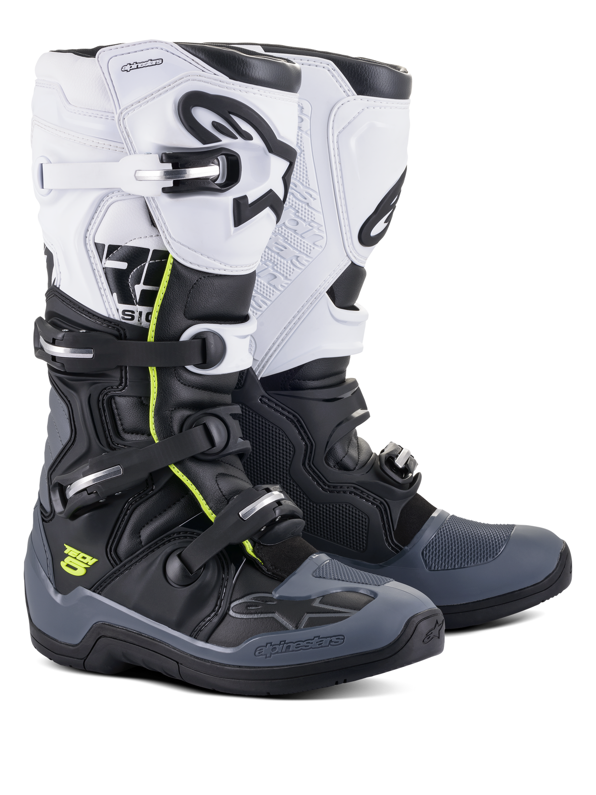 Botas Alpinestars Tech 5, botas de motocross e off-road, pretas, cinzento escuro e brancas com detalhes em amarelo néon, sistema de fecho de quatro fivelas, painel superior branco com logótipo Astars preto, proteção na biqueira e no calcanhar em cinzento escuro e construção em microfibra durável