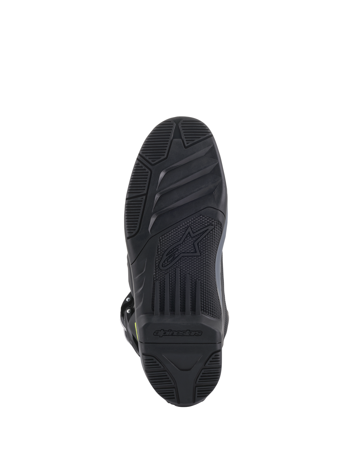 Botas Alpinestars Tech 5, vista da sola, pretas, padrão de rasto texturizado detalhado para aderência em todo-o-terreno, com o logótipo Alpinestars e o símbolo da estrela em relevo, construção durável de calçado de motocross