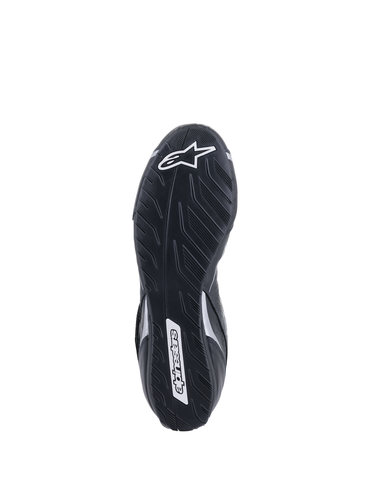 Sapatos Alpinestars Tech-1 T V3 FIA, vista da sola, pretos e prateados, sola exterior de borracha assimétrica com padrão de rasto de pneu, logótipo Alpinestars em branco, composto fino para sensibilidade aos pedais