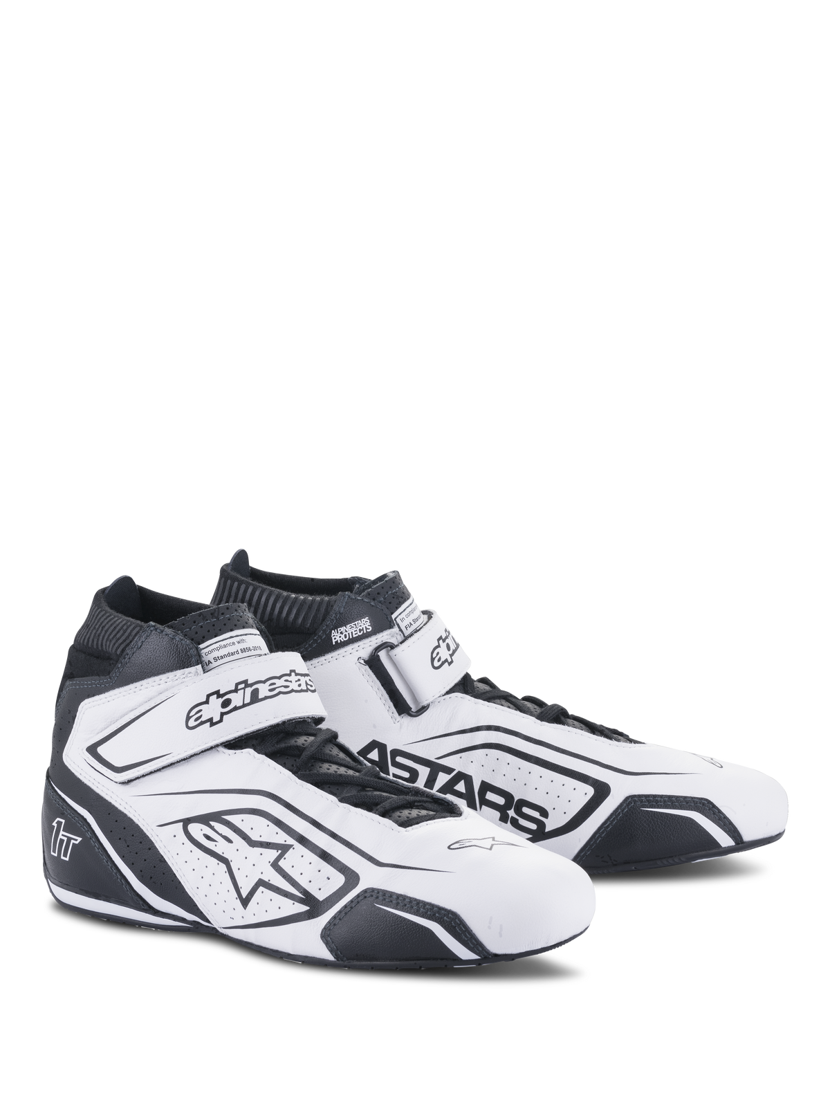 Alpinestars Tech-1 T V3 Shoes FIA, sapatos de corrida brancos e pretos, calçado profissional de automobilismo, certificação FIA, design de cano alto em pele com ventilação perfurada, tira de velcro no tornozelo e logótipo Astars preto em destaque.