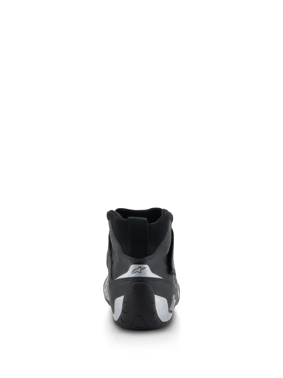 Sapatos Alpinestars Tech-1 Z V3 FIA, sapatos de automobilismo, pretos e prateados, vista traseira mostrando o calcanhar contornado com detalhes prateados e logótipo de estrela, calçado profissional para desportos motorizados