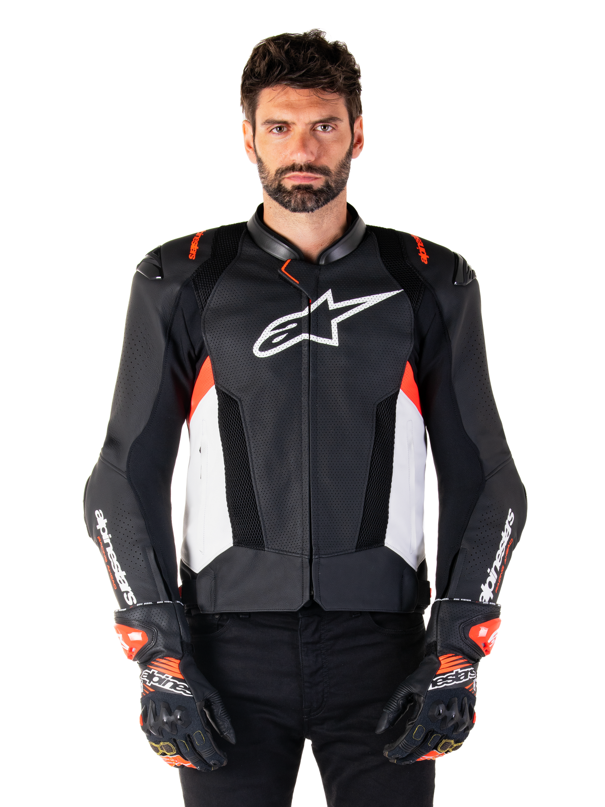 Casaco de pele Alpinestars Missile V3 Airflow, casaco de corrida para motociclismo, preto e branco com detalhes em vermelho fluo, painéis de ventilação perfurados, logótipo de estrela branca no peito, usado com luvas pretas e vermelhas, construção em pele premium