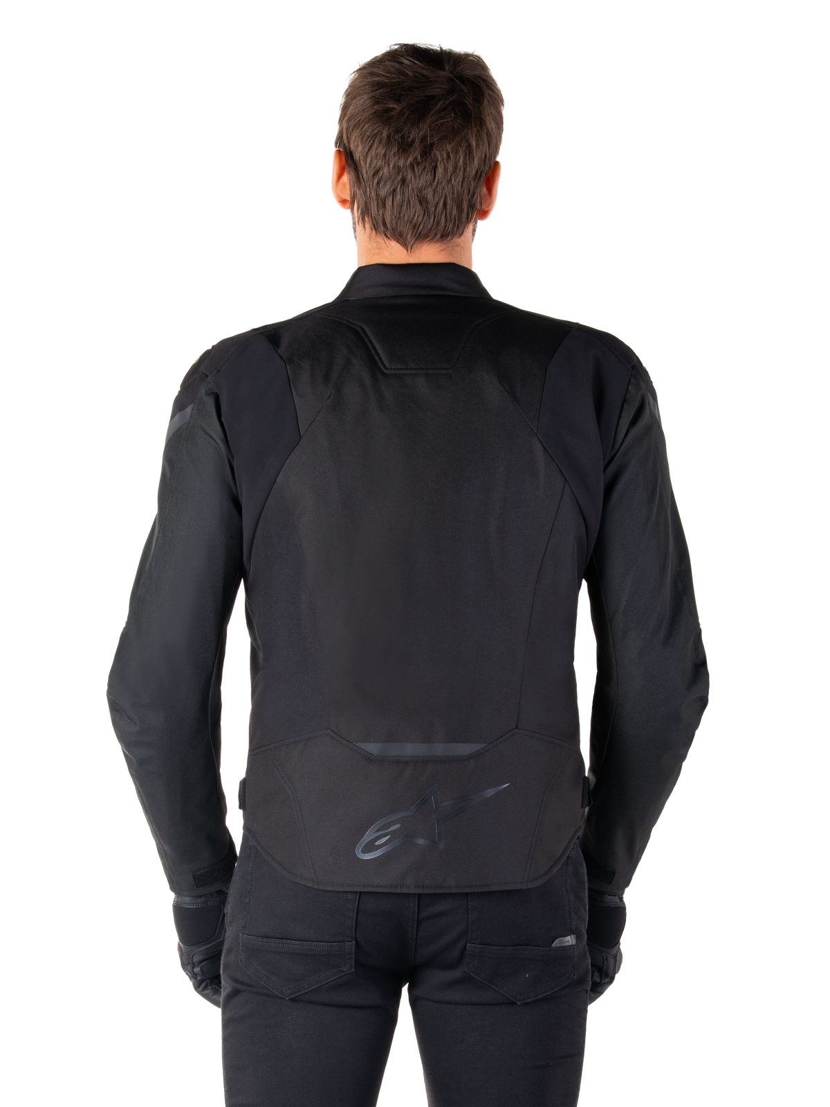 Casaco Impermeável Alpinestars T-Jaws V4, casaco de motociclismo têxtil, preto, vista traseira com o logótipo Alpinestars na zona inferior das costas, corte desportivo para condução em estrada