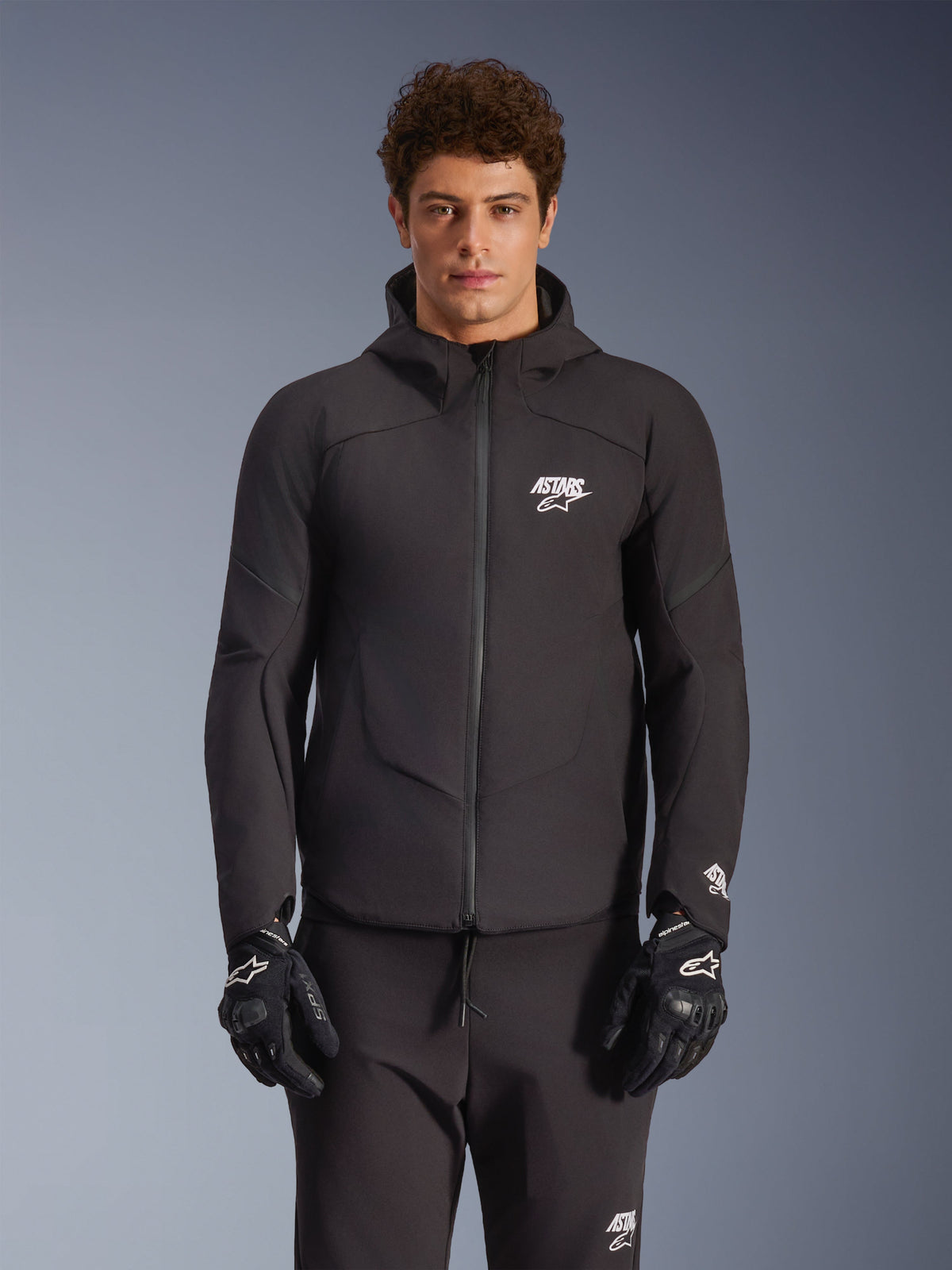 Alpinestars Aeroshell Waterproof Jacket, casaco de moto urbano para homem, preto, em softshell impermeável com capuz.