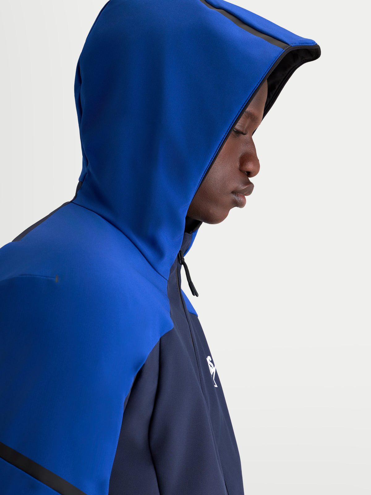 Alpinestars Aeroshell WP casaco de moto, impermeável para homem, azul escuro e azul brilhante, com capuz, detalhe de modelo com capuz colocado