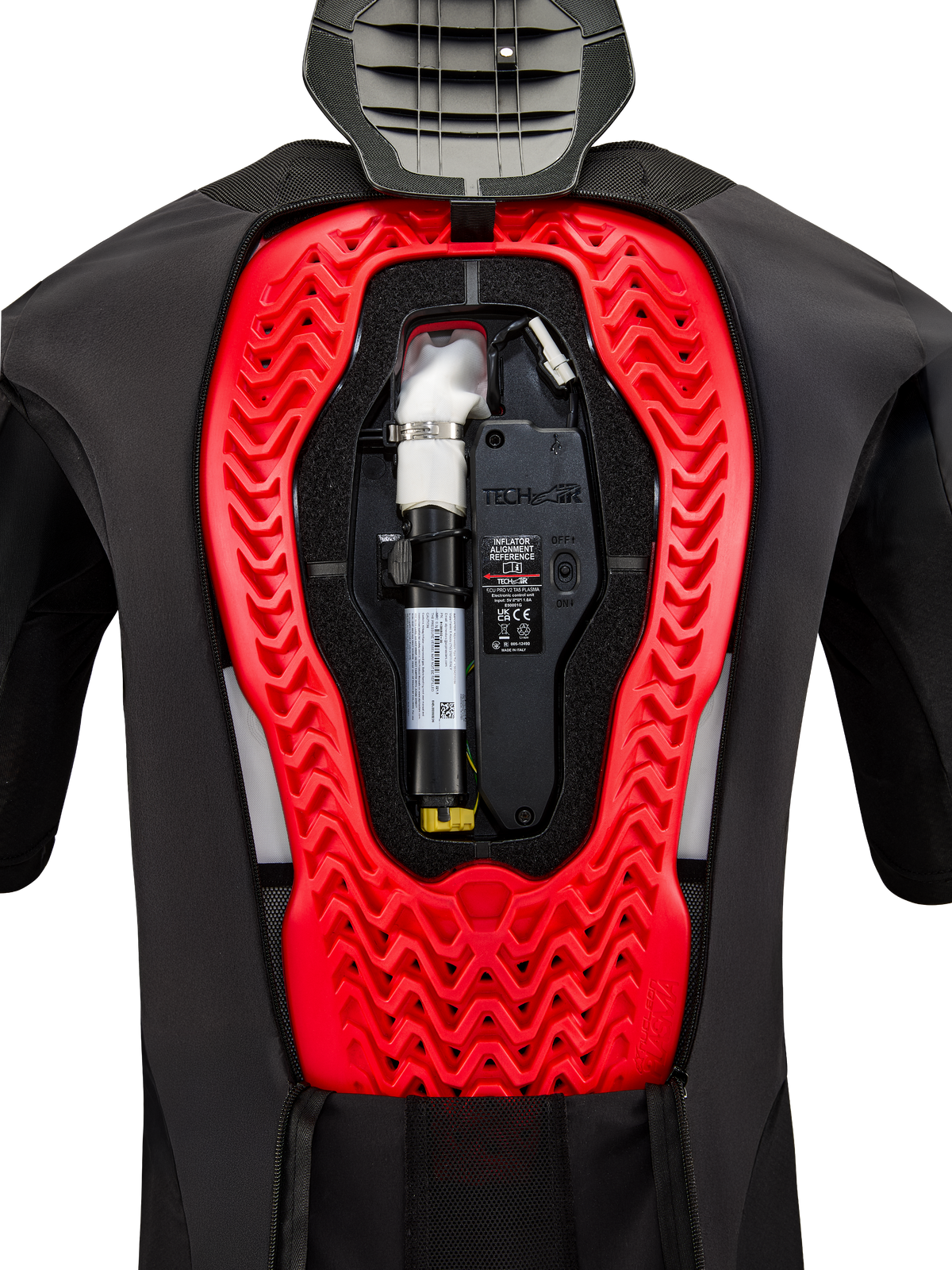 Sistema de Airbag Alpinestars Tech-Air 5 Plasma, vista interior que mostra o cartucho de substituição preto instalado e a unidade de controlo eletrónico, integrados num protetor de costas Nucleon Plasma vermelho vibrante dentro de um colete protetor preto