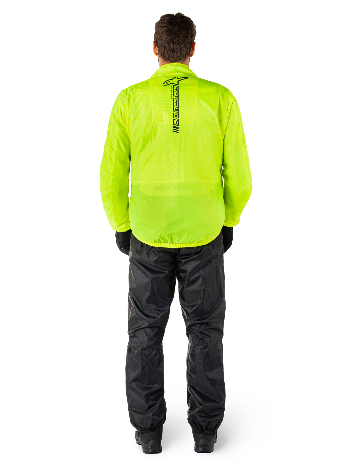 Alpinestars Hurricane Rain V2 Jacket and Pants, waterproof motorcycle rain suit, Bright Fluorescent Yellow jacket with vertical black branding on the back, Black pants, lightweight textile material designed for wet weather riding protection