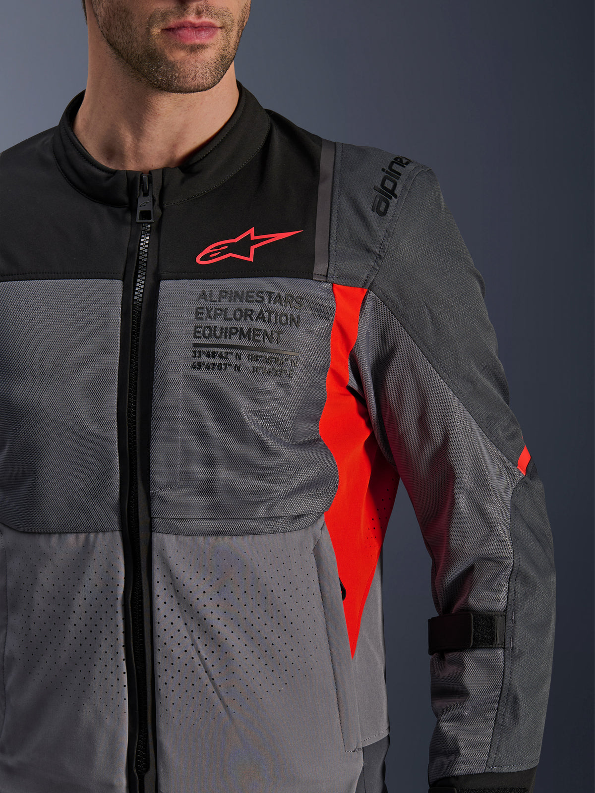 Alpinestars ST-2 Air Jacket in Gray and Red, a men's textile motorcycle jacket with breathable mesh panels.