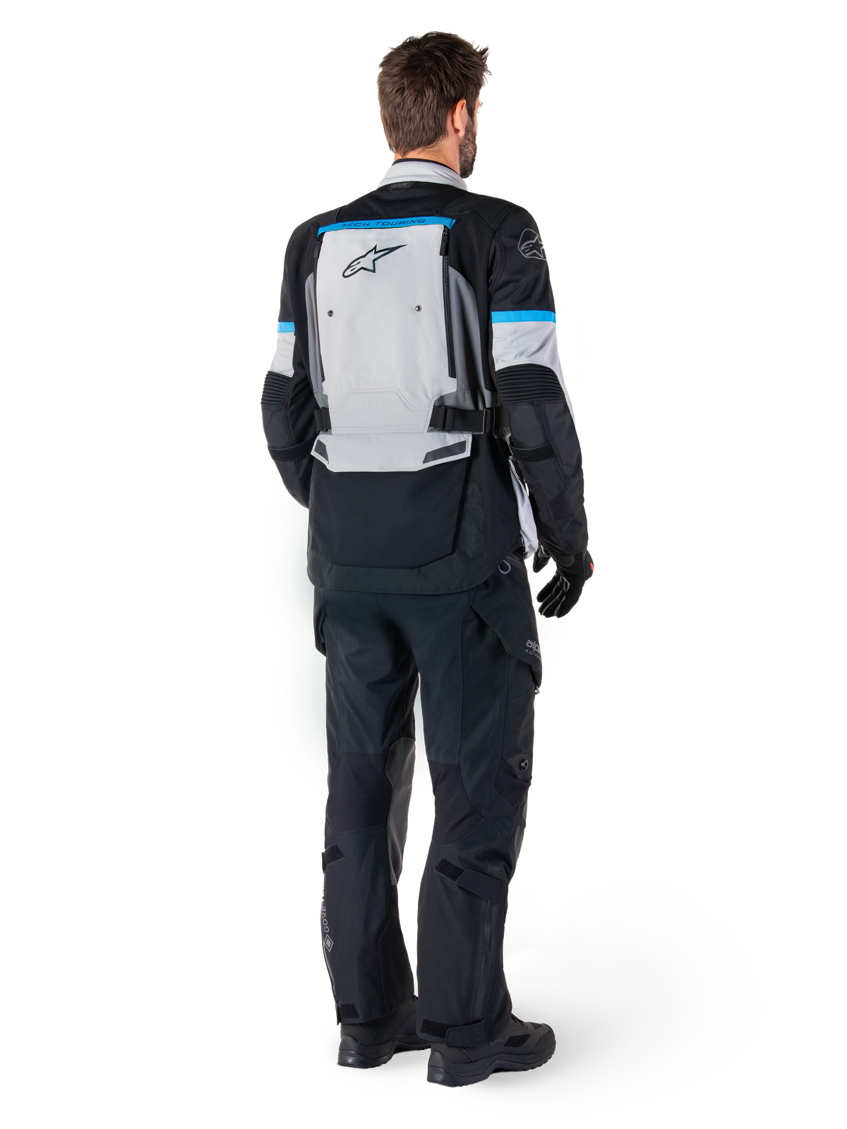 Alpinestars Bogota' Pro Drystar®, casaco de moto adventure touring para homem, cinzento gelo, preto e ciano, vista traseira.
