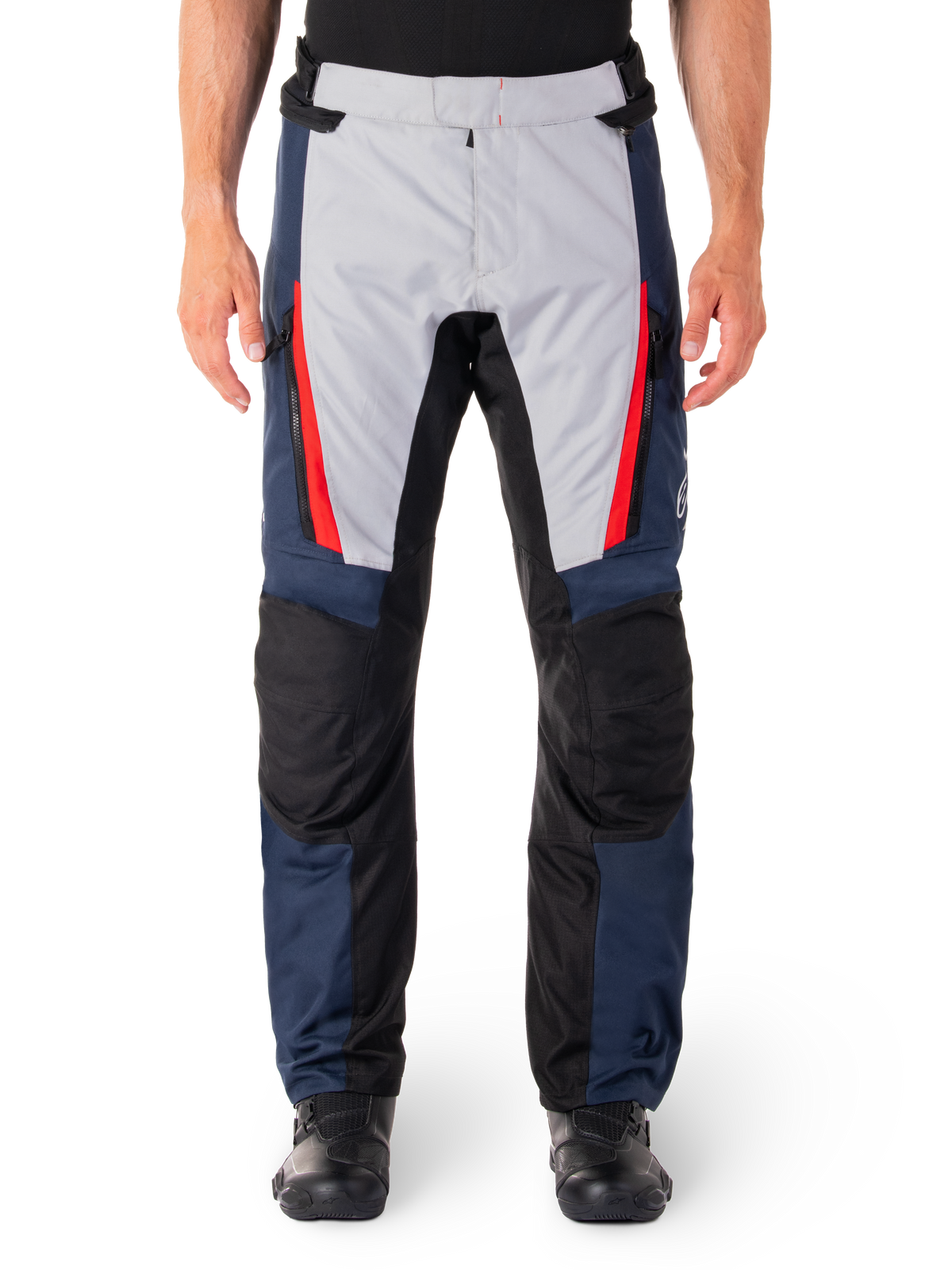 Alpinestars ST-1 Waterproof Pants, Motorcycle Touring Pants, Dark Blue and Light Gray with Bright Red Accents, Black Reinforced Knee Panels, Front View Worn with Black Boots, Waterproof Adventure Touring Gear