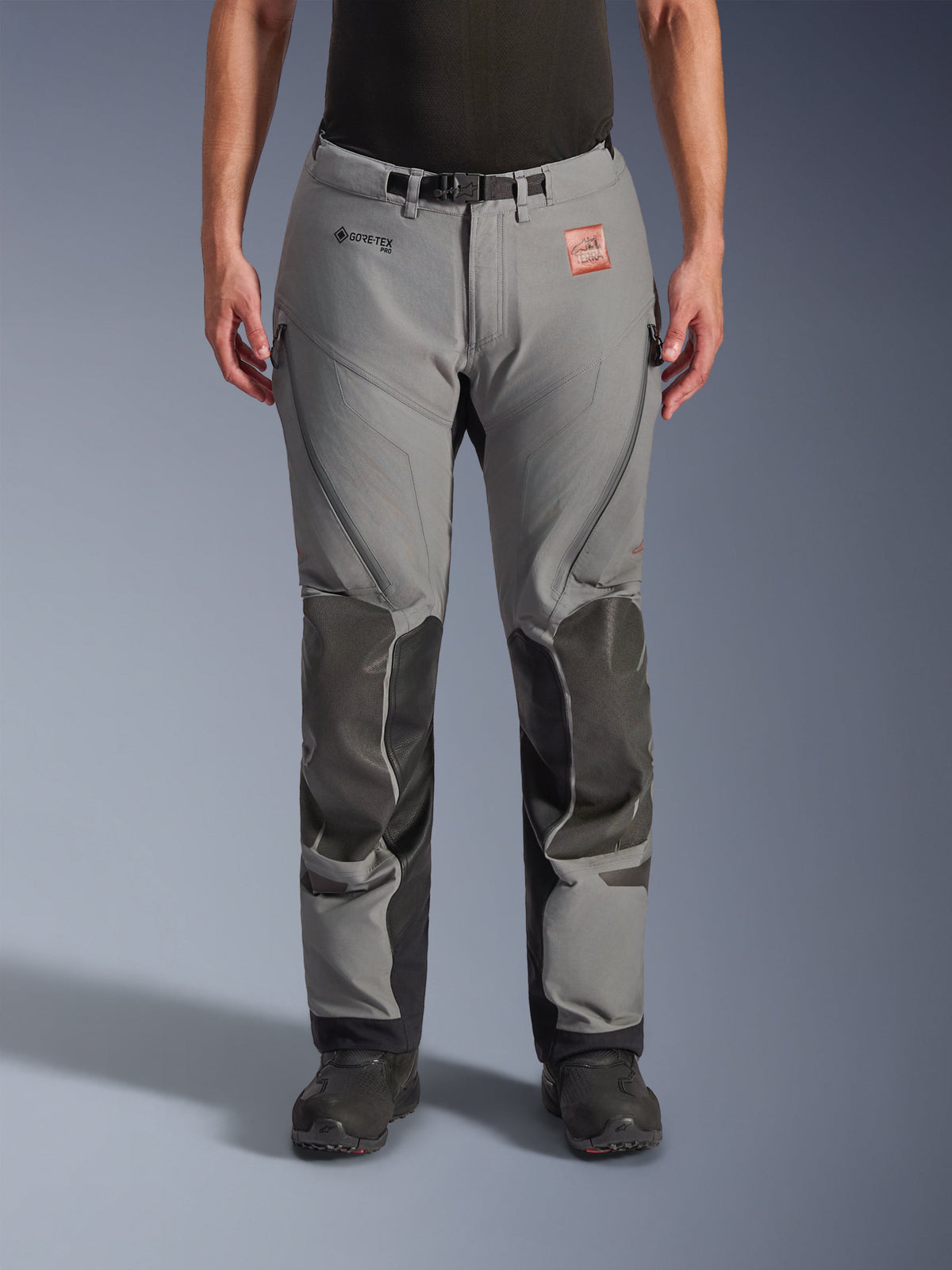 Alpinestars Nazca 3L GORE-TEX PRO Pants, Gray with black knee and shin reinforcements, technical adventure motorcycle riding pants, front view, featuring GORE-TEX branding, zippered thigh vents, and adjustable waist belt