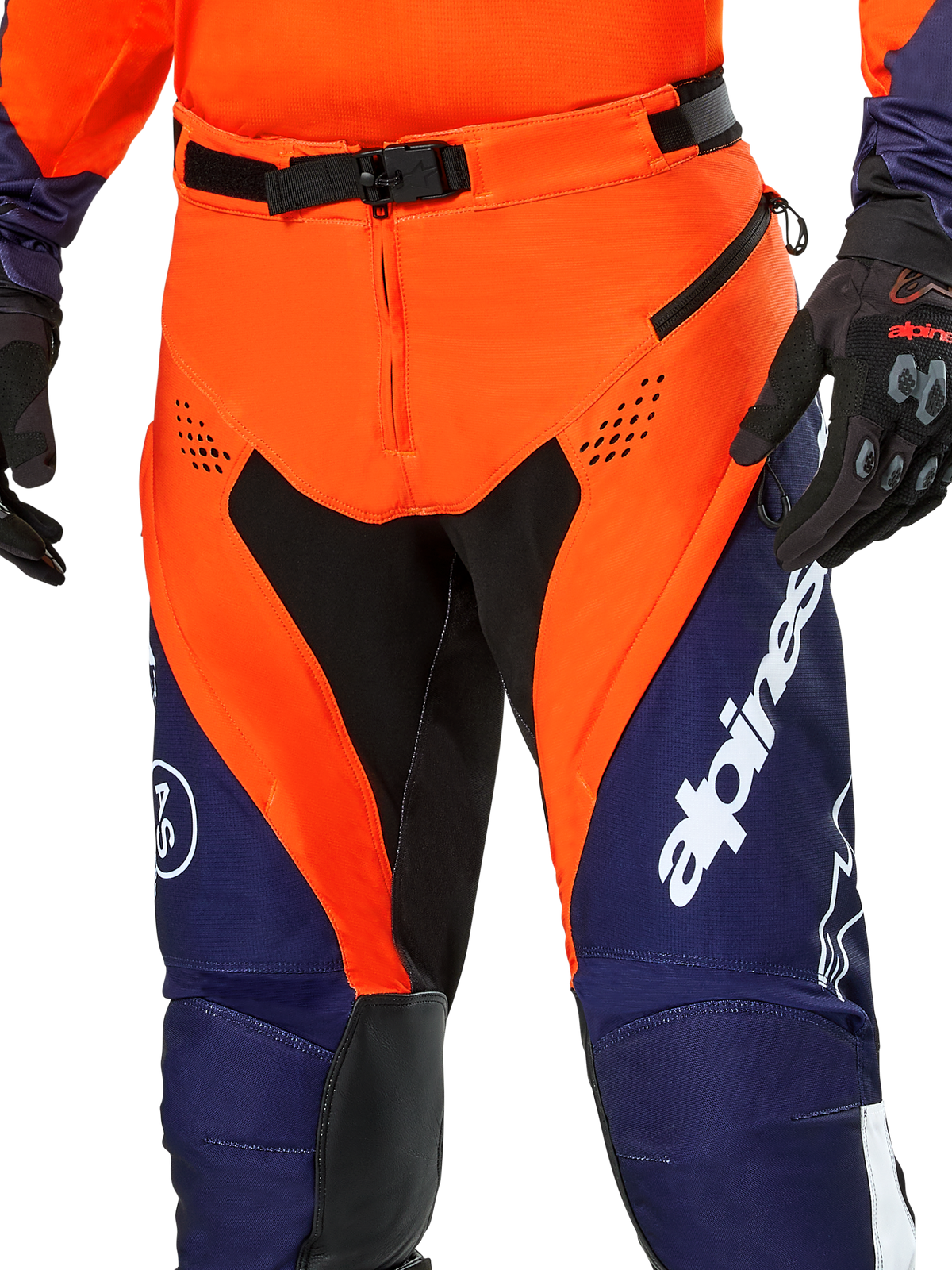 Alpinestars Pro-Dura Pants, Enduro Motorcycle Pants, Navy Hot Orange and White, detail view of the waist featuring SX2 magnetic buckle and zippered thigh vents, durable ripstop material with bold branding, worn with matching gear