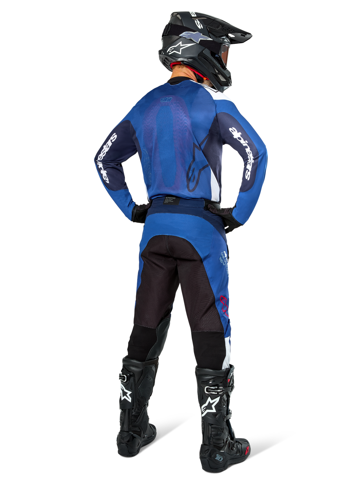 Alpinestars Pro-Dura Pants, Motocross and Enduro Pants, Navy Bright Blue White, back view, worn with matching blue jersey, black helmet, and black Tech boots, durable construction with stretch inserts for off-road riding