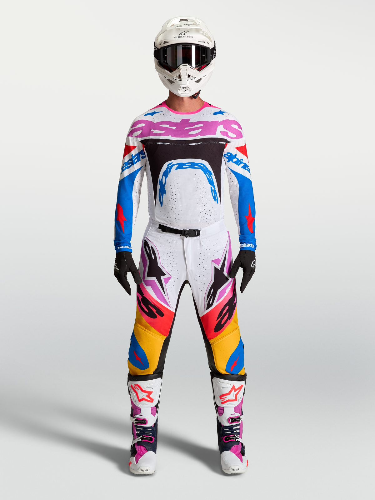 Alpinestars Supertech Dyna, fato de motocross para homem, branco e azul com pormenores rosa, conjunto de calças e camisola de alto desempenho.