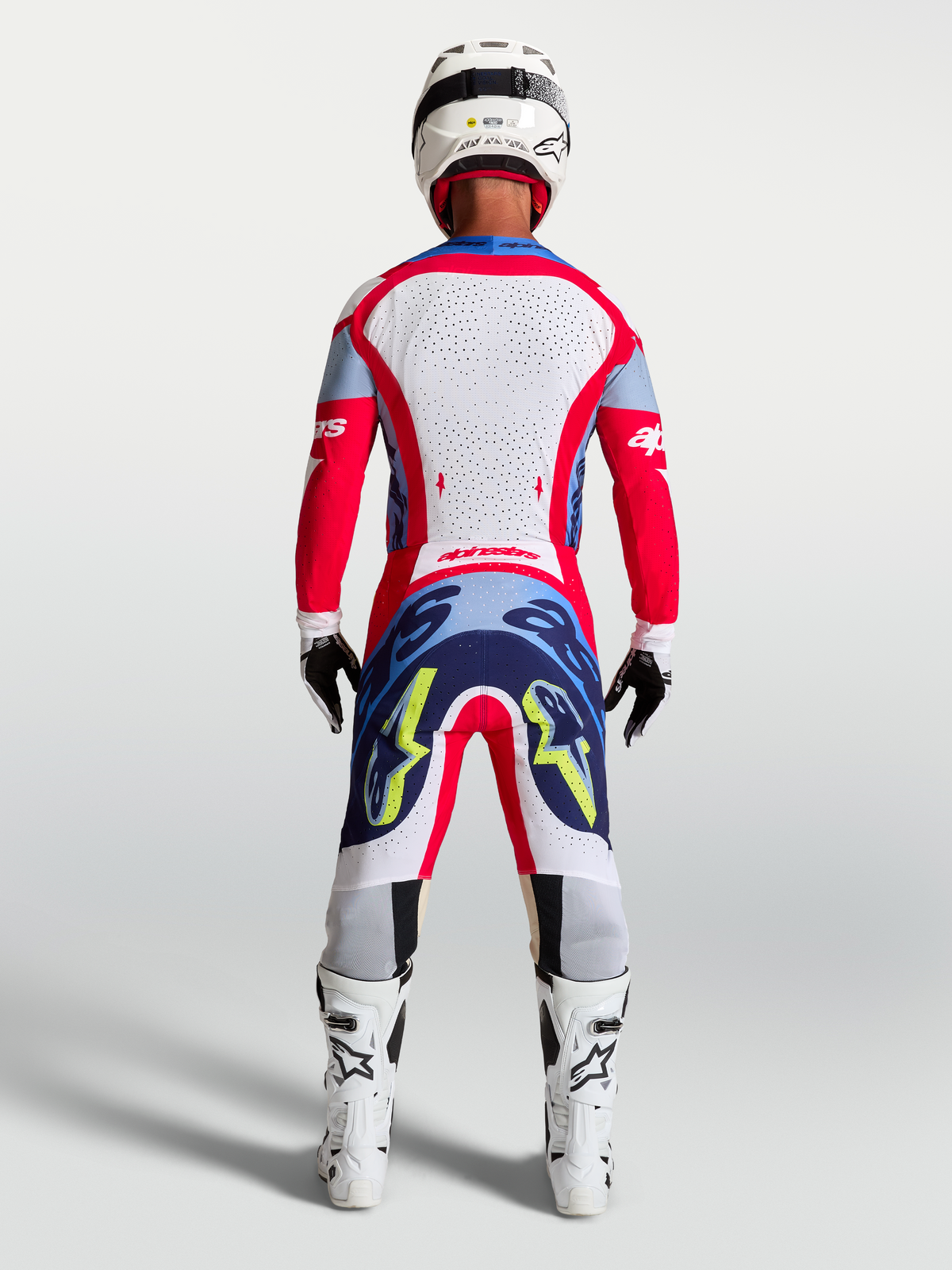 Alpinestars Supertech Dyna, calças de corrida de motocross para homem, vermelhas e azul-marinho, vista traseira.