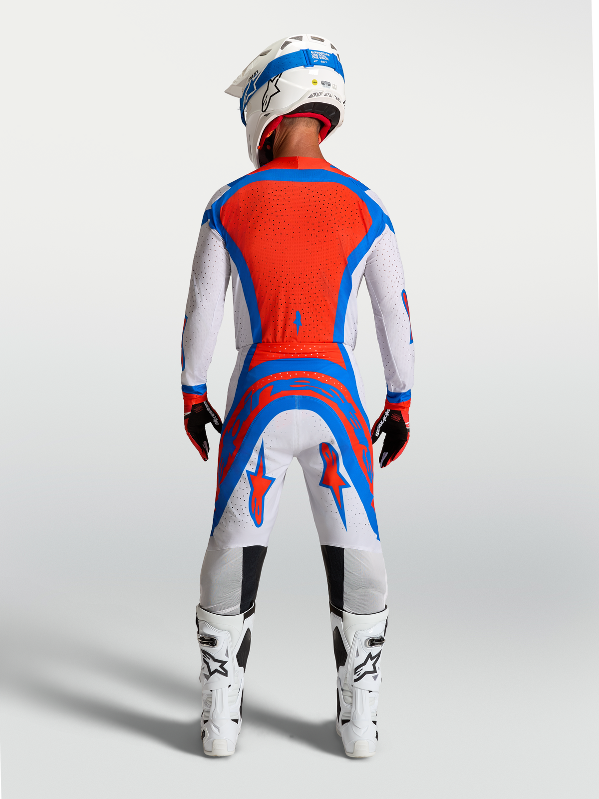 Alpinestars Supertech Vesta, calças de motocross para homem, lilás claro e vermelhas, ajuste atlético de corrida, vista traseira