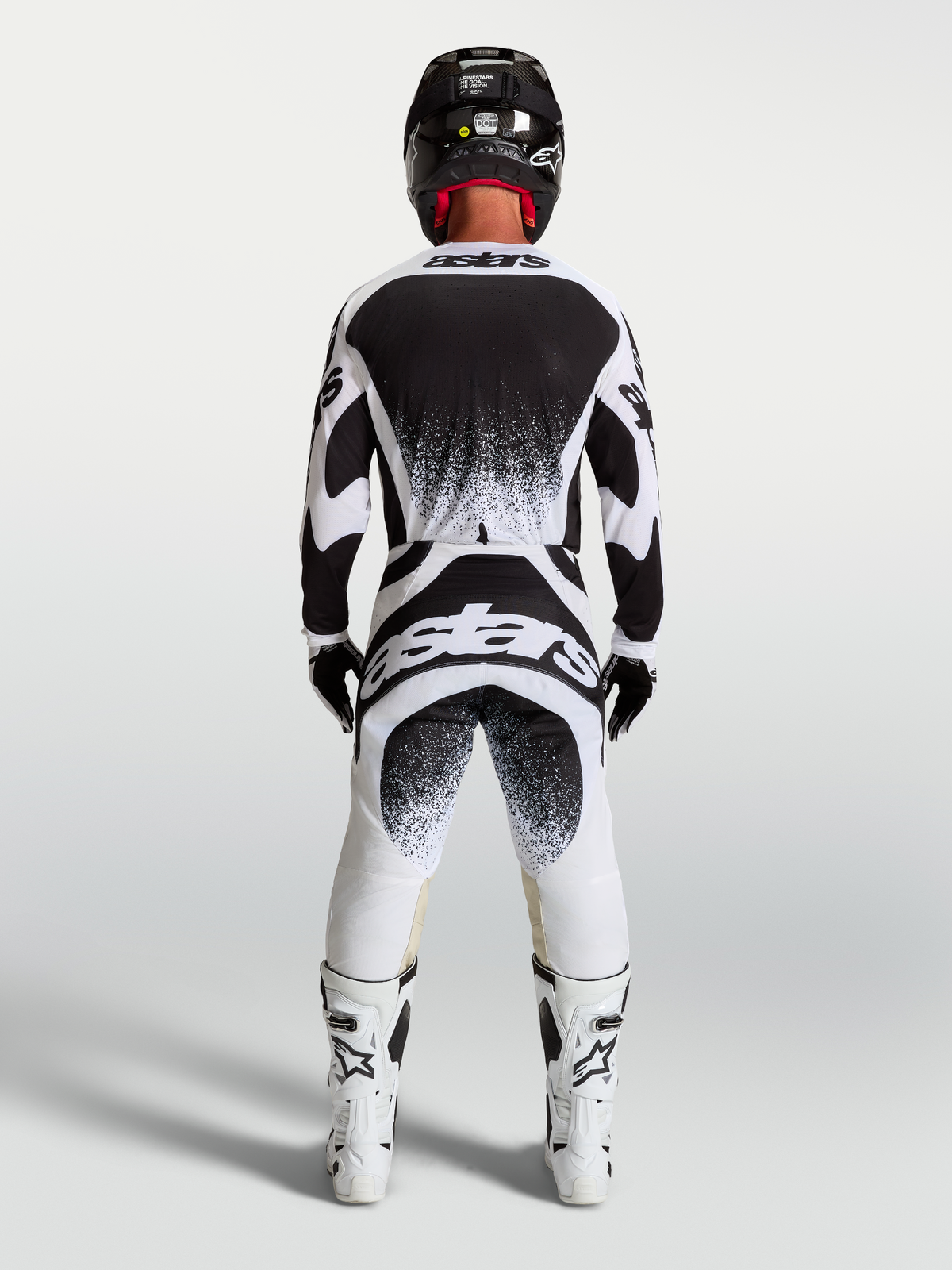 Alpinestars Techstar Swan, conjunto de camisola e calças de motocross para homem, preto e branco, ajuste atlético de corrida com logótipo Astars nas costas, vista traseira