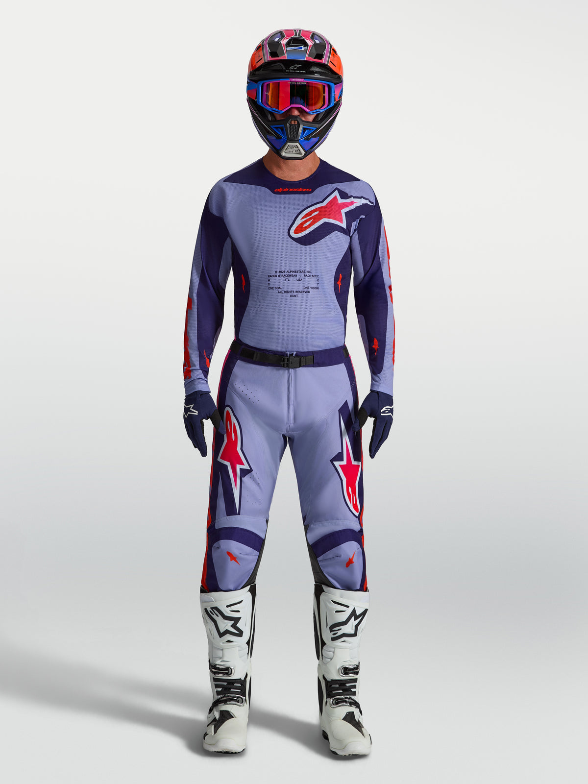 Calças Racer Air Hunt da Alpinestars, calças de motocross para homem, roxas claras e rosa fluo, com malha ventilada para fluxo de ar e design ergonómico para off-road.
