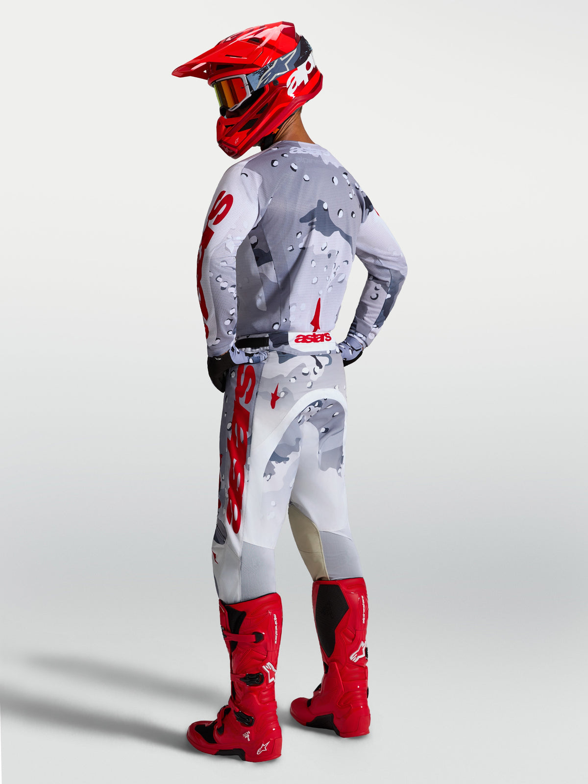 Alpinestars Racer Air Lone Pants in Gray Camo and Fire Red, ventilated motocross gear for men with performance stretch.