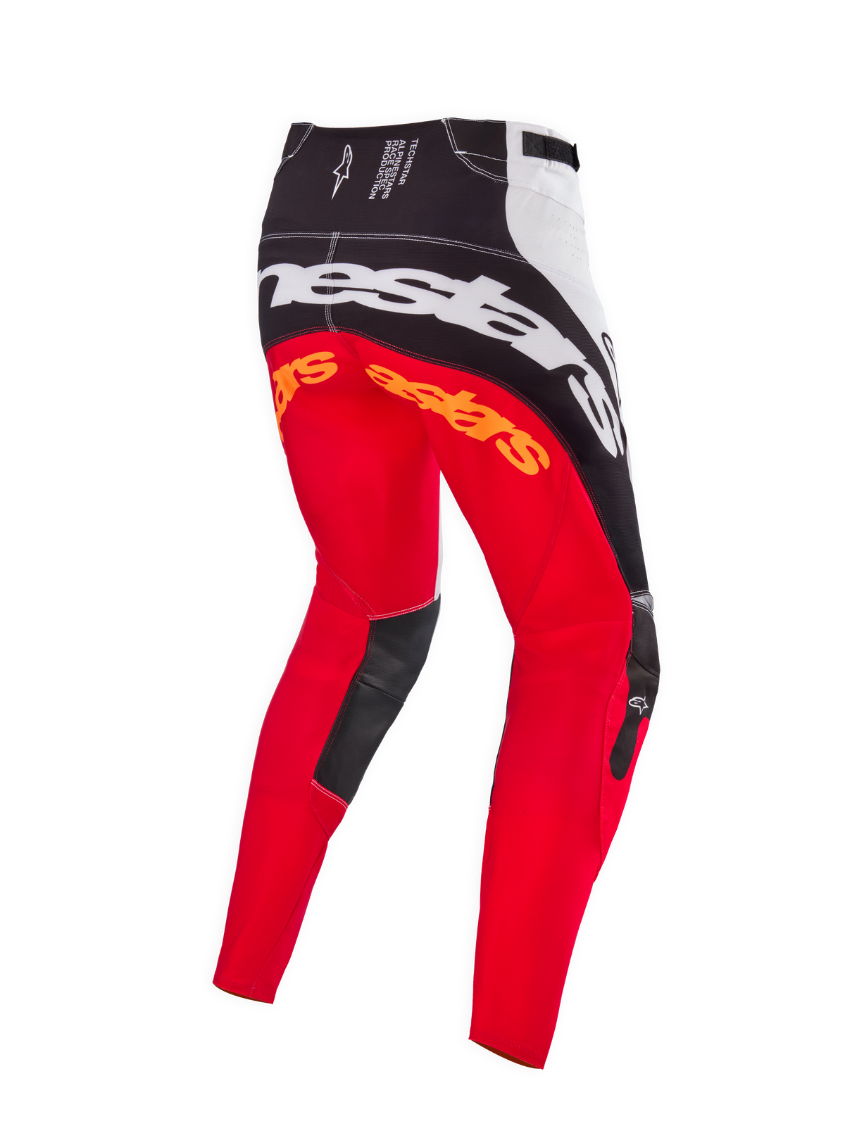 Calças de Motocross Alpinestars Limited Edition Techstar Deep, combinação de cores preto, branco e vermelho, vista traseira com grande logótipo Alpinestars em branco no assento, logótipos laranja na parte superior das pernas e painéis internos dos joelhos em pele preta, concebidas para competição profissional de todo-o-terreno.