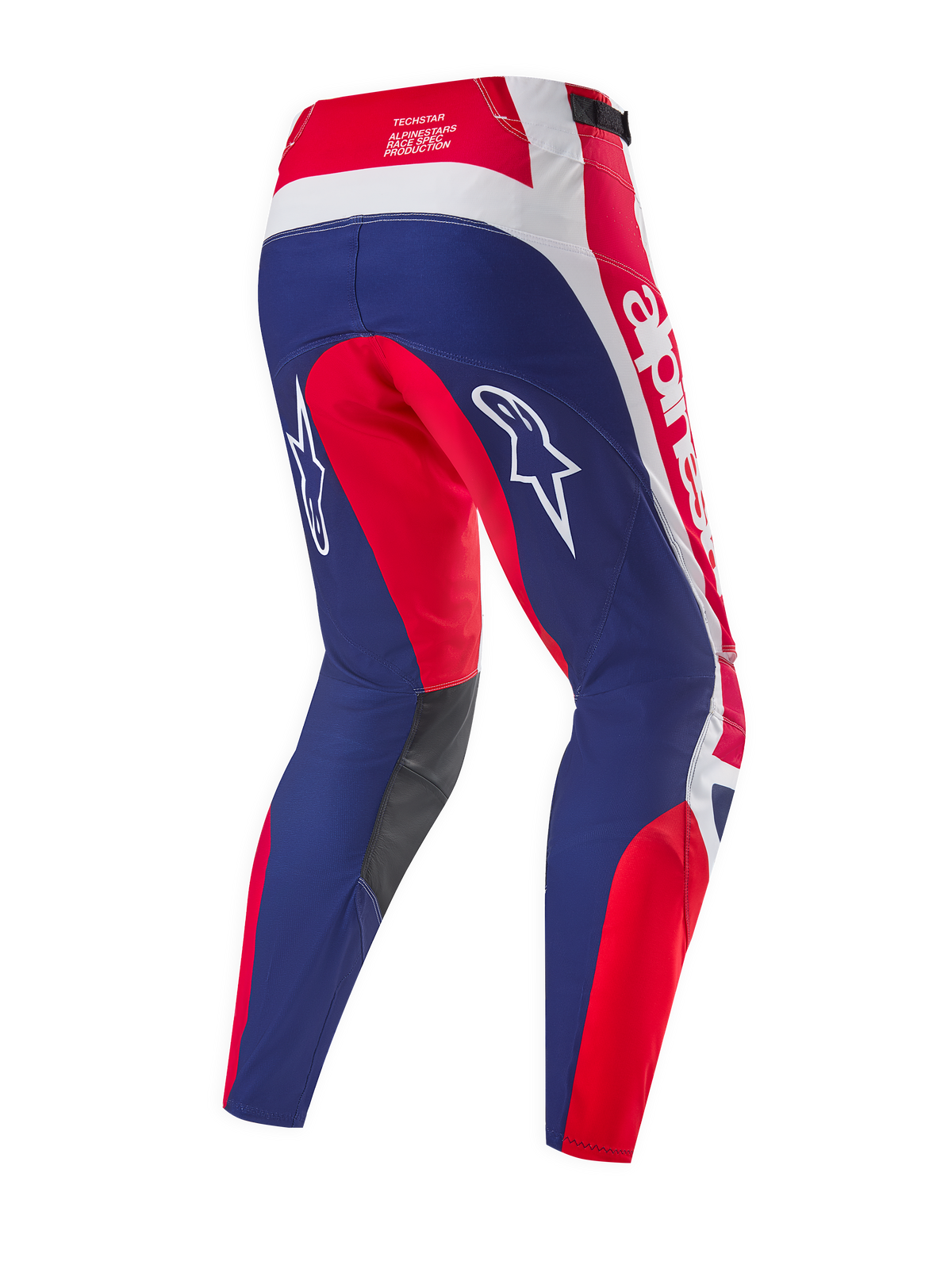 Alpinestars Limited Edition Techstar Fortitude Pants, calças de motocross, em vermelho brilhante, branco e azul, vista traseira mostrando painéis azuis no assento e nas pernas com detalhes em vermelho e branco, logótipos de estrela brancos nas coxas e marca Techstar race spec no cós.