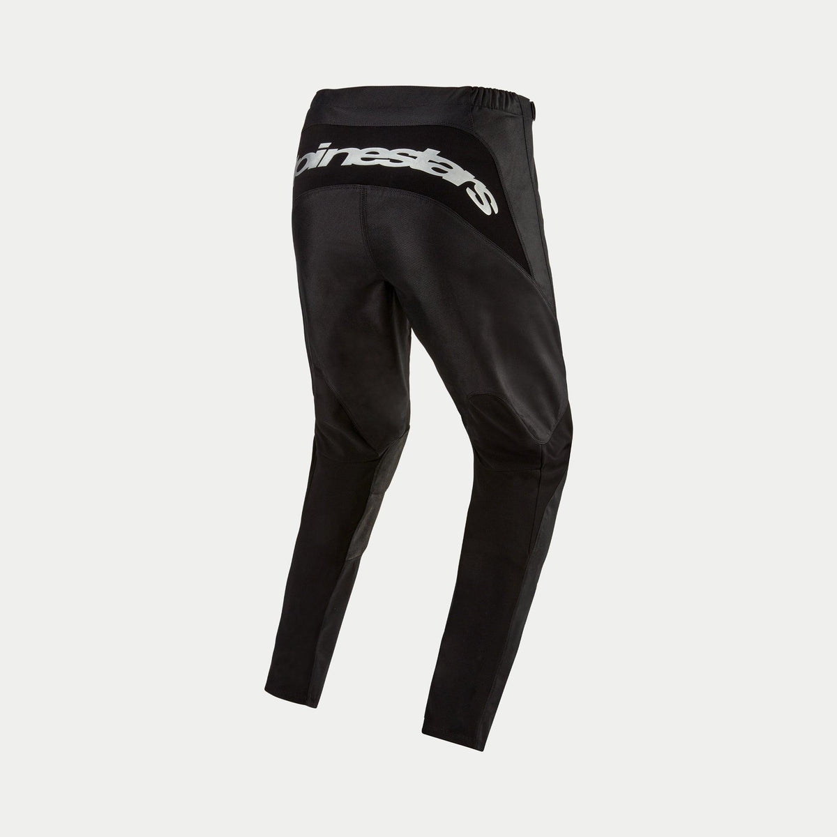 Alpinestars 2024 Fluid Graphite Pants, calças de motocross, pretas e prateadas, vista traseira com logótipo Alpinestars prateado na pala traseira, design desportivo com painéis reforçados, poli-tecido durável para corridas off-road