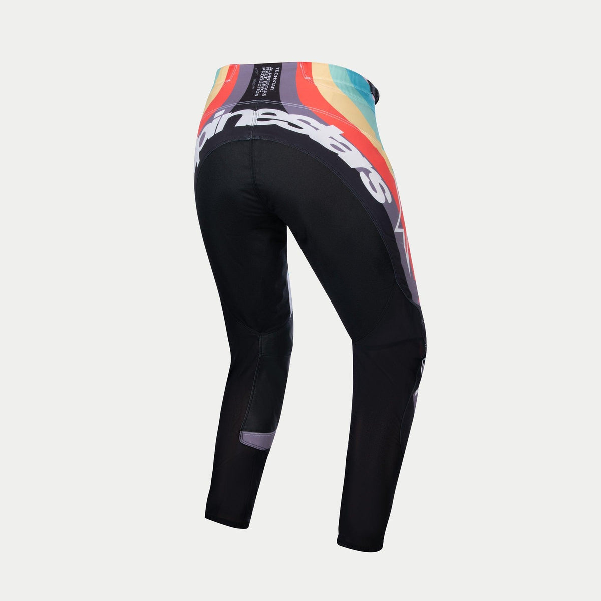 Alpinestars Women Stella 2024 Techstar Pants, Motocross Pants, Black Multicolor, rear view featuring a vibrant wave pattern in red, orange, and blue on the waist, large white Alpinestars branding across the back, designed for off-road racing