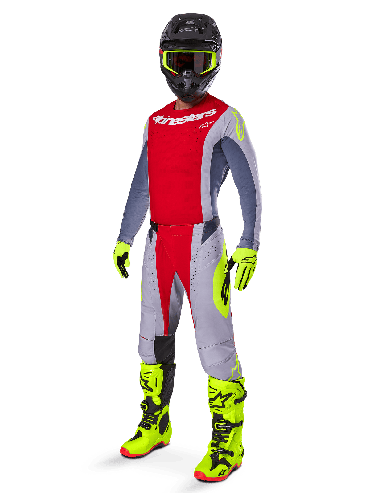 Piloto de motocross com camisola Alpinestars 2025 Techstar Melt em vermelho vivo e cinzento, peito vermelho e mangas cinzentas com detalhes amarelo néon, calças a condizer, botas e luvas em amarelo vivo, capacete preto com óculos de armação amarela, equipamento completo de corrida off-road