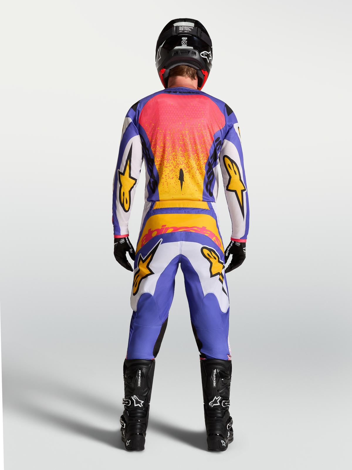 Alpinestars Fluid Drag Jersey, Men's Blue and Lilac Motocross Jersey with Gold accents, shown from behind on-model.