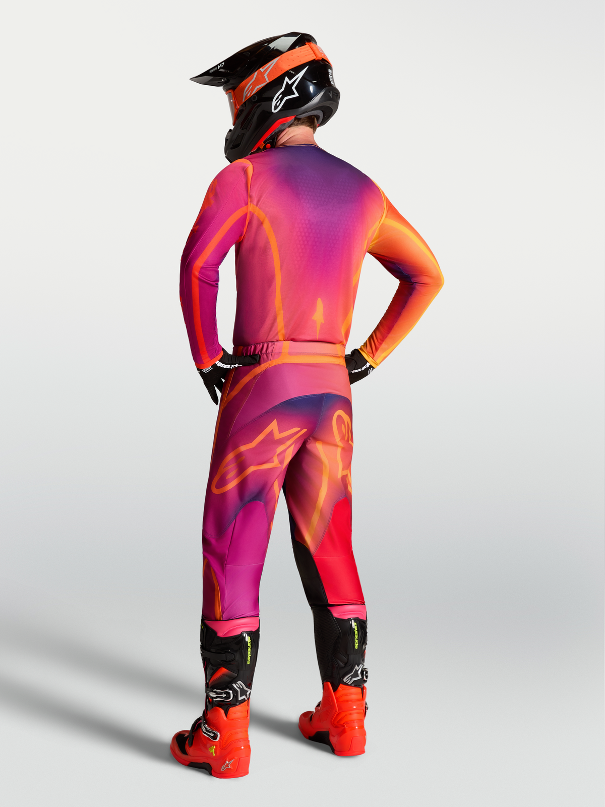 Alpinestars Fluid Kepler Pants, purple and orange motocross gear for men, rear view showing ergonomic sport-fit.