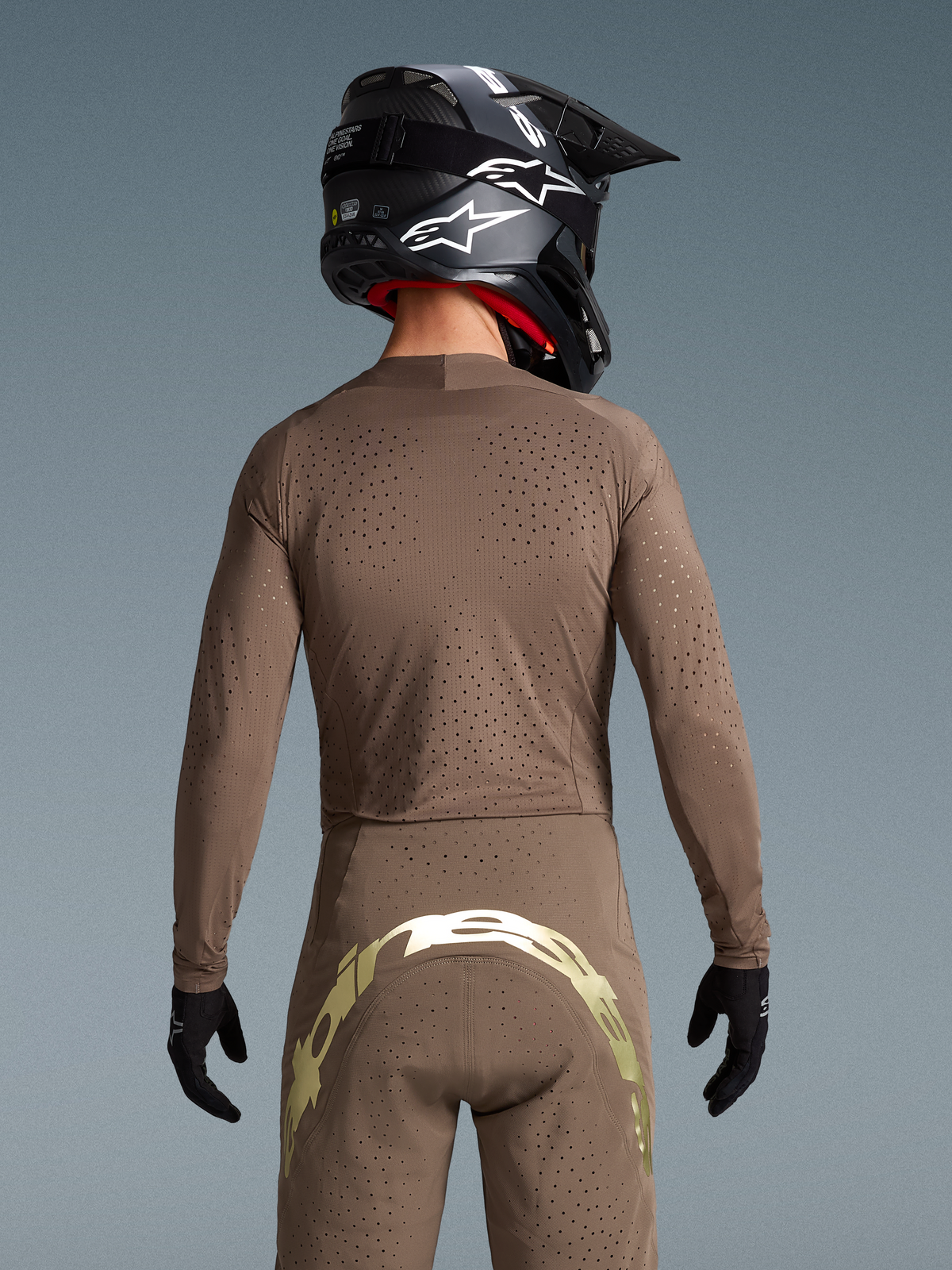 Alpinestars Camisola Supertech Air Gold Edição Limitada e calças MX, equipamento de motocross para homem, castanho e dourado, vista traseira com ventilação a laser