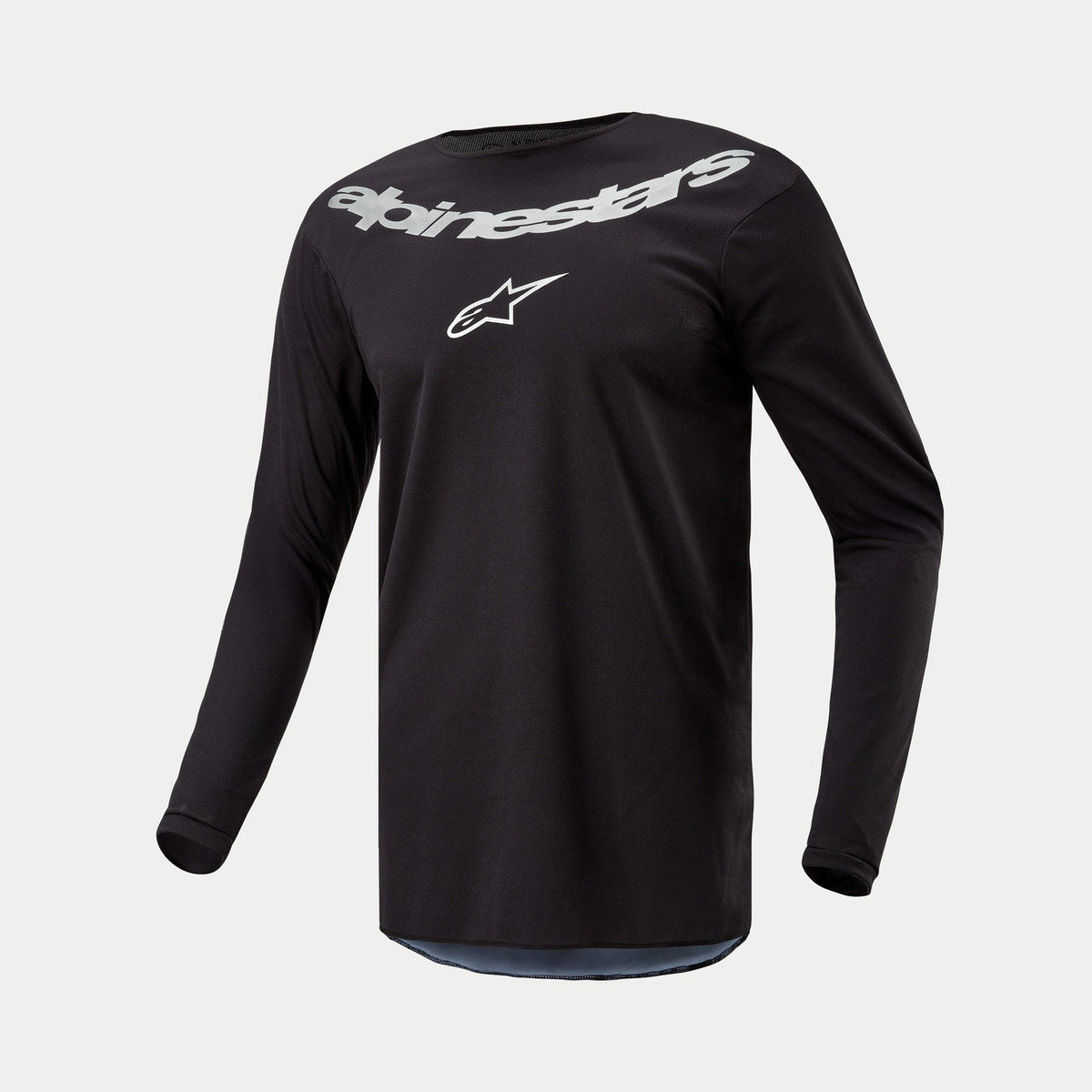 Alpinestars 2024 Fluid Graphite Jersey, camisola de motocross, preta e prateada, camisola de manga comprida de alto desempenho com logótipo Alpinestars grande e logótipo de estrela no peito em prateado, poli-tecido leve que absorve a humidade para condução todo-o-terreno