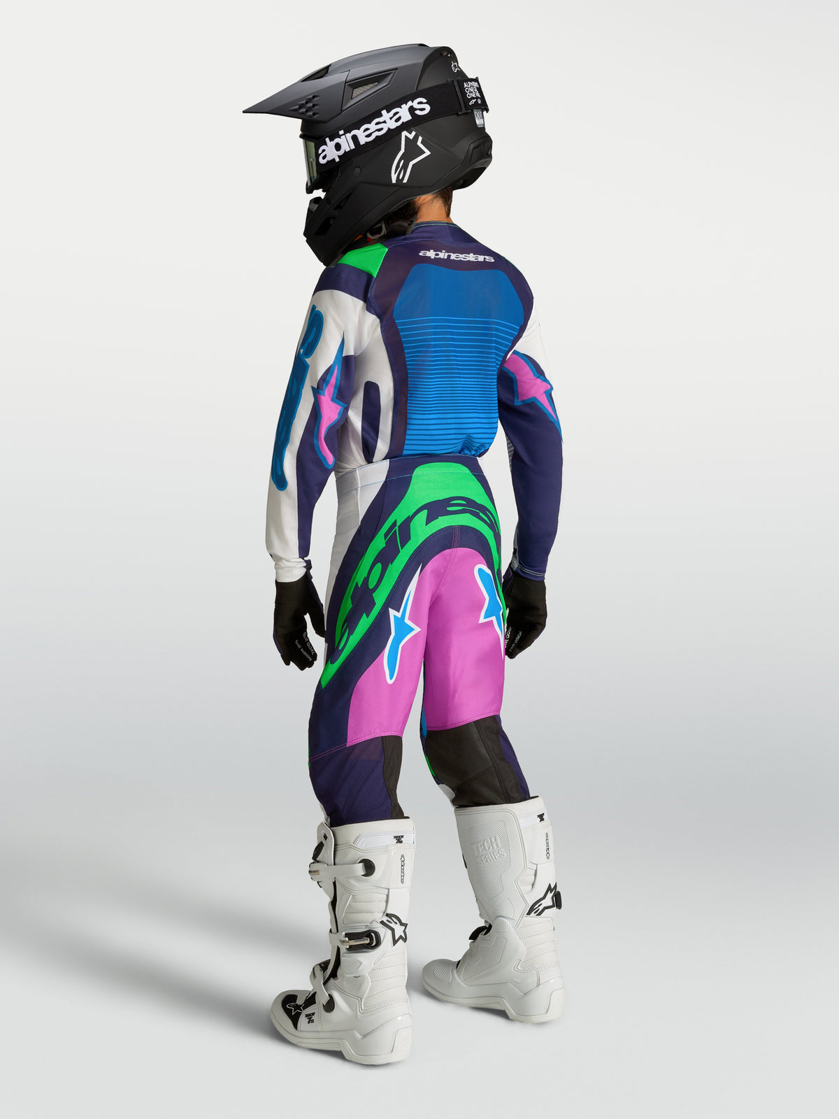 Alpinestars Camisola e Conjunto Supertech Maven Jovem 2027, motocross, azul e verde fluo, vista traseira, ajuste atlético.