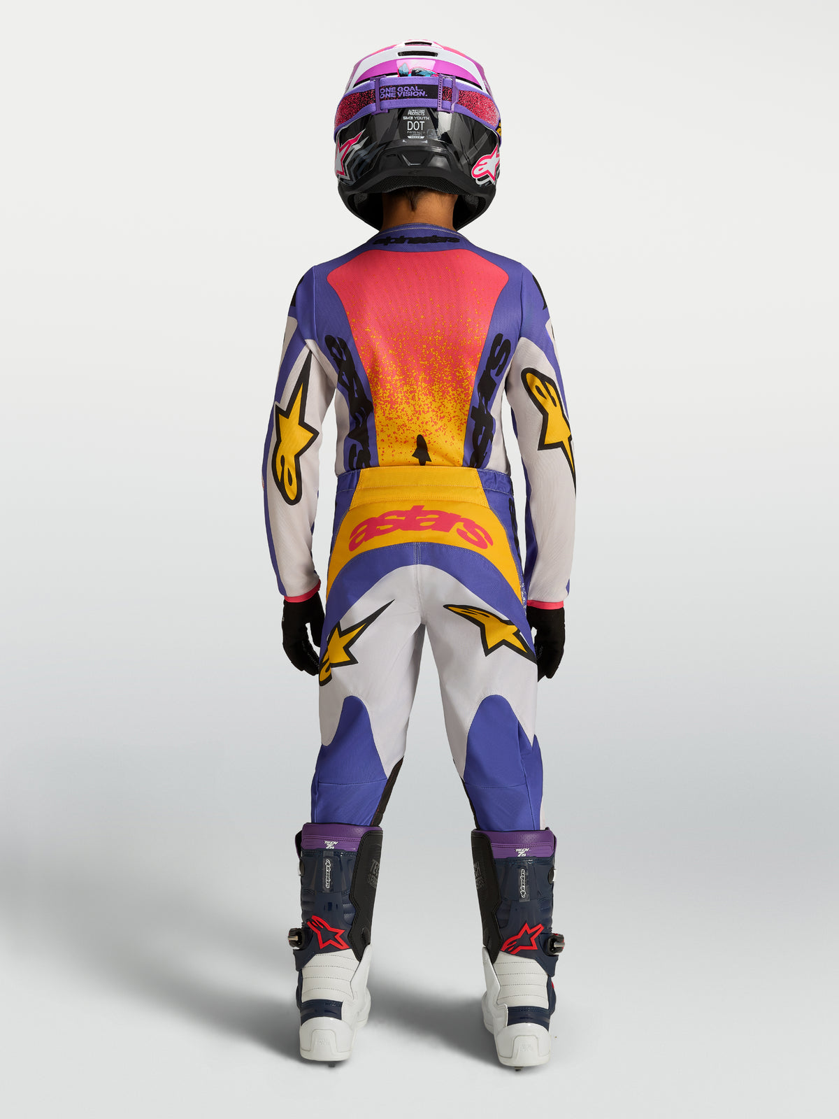 Alpinestars Juventude Fluid Drag Gear Set 2027, equipamento de motocross para jovens, azul e dourado, vista traseira.