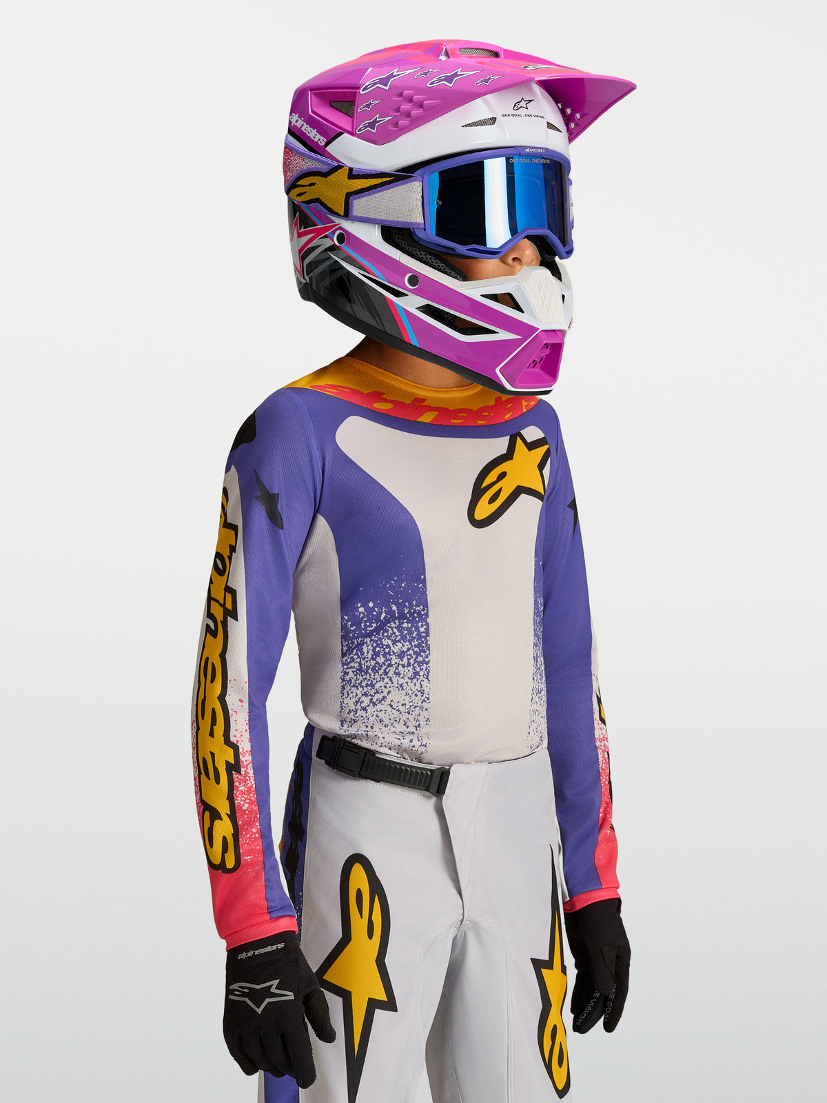 Alpinestars Camisola Youth Fluid Drag, camisola de motocross para juventude, azul e branca com pormenores amarelos.