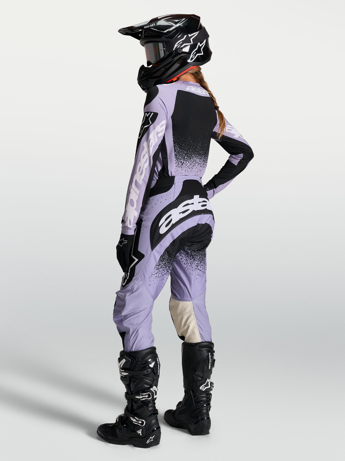 Alpinestars Stella Techstar Swan, calças de motocross para mulher, roxo claro e preto, com ajuste de corrida ergonómico.