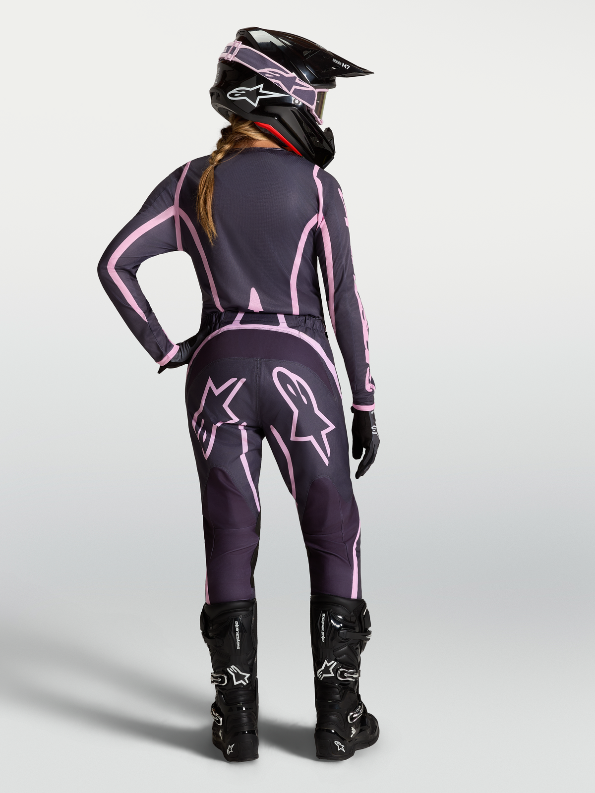Alpinestars Stella Fluid Apex V2 Women's Motocross Pants, Graystone and Pink, rear view on rider with matching gear.