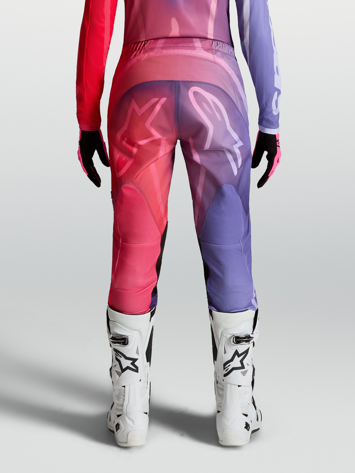 Alpinestars Stella Fluid Kepler, calças de motocross para mulher, roxas e vermelhas, vista traseira, design ergonómico