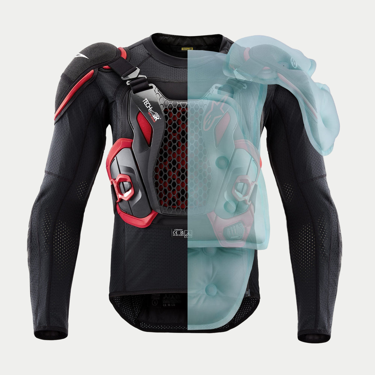 Airbag Tech-Air® Off-Road, vista dividida de casaco de proteção preto e vermelho com sobreposição de airbag azul insuflado.